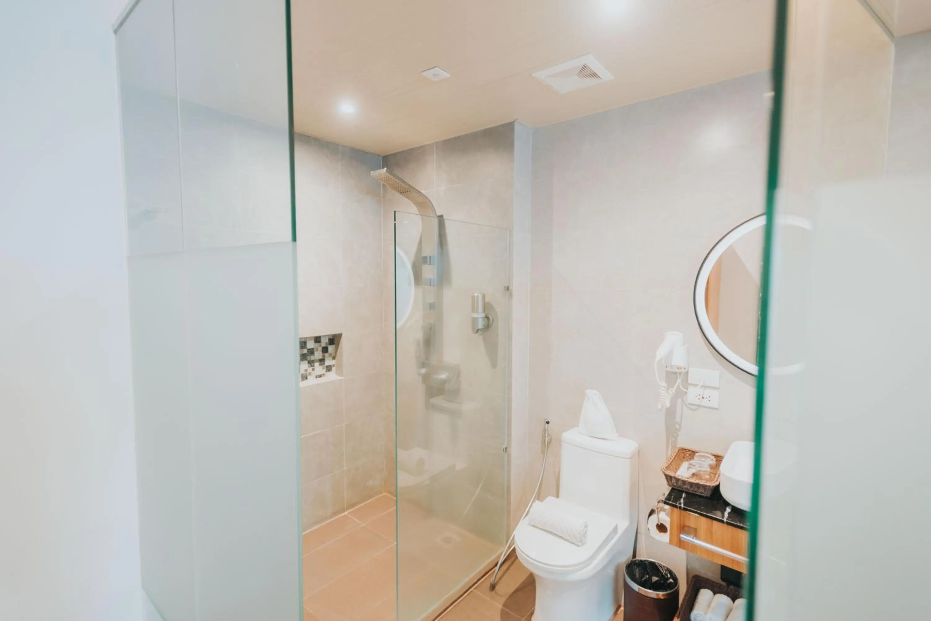 Bathroom in SureStay Plus Hotel by Best Western AC LUXE Angeles City