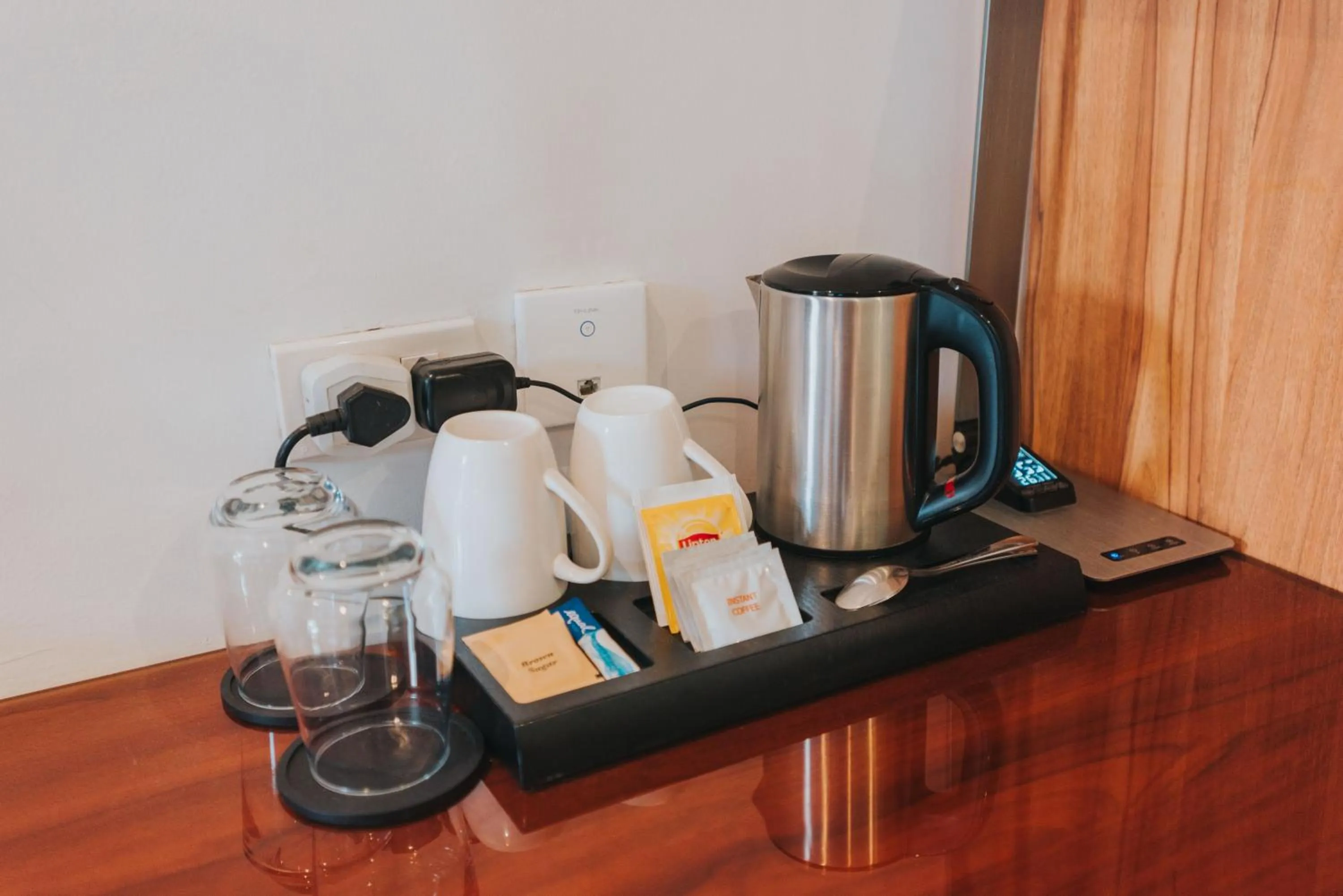 Coffee/tea facilities in SureStay Plus Hotel by Best Western AC LUXE Angeles City