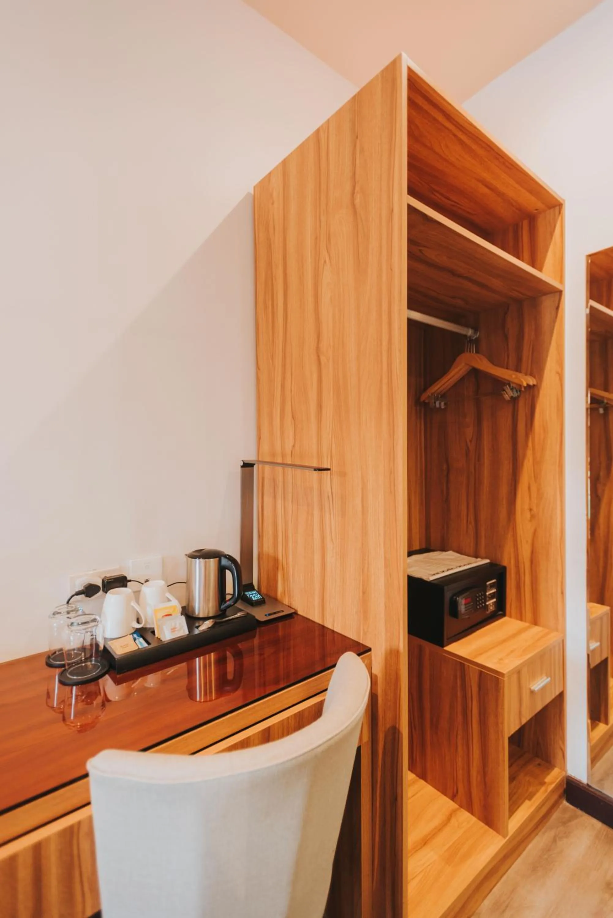 minibar in SureStay Plus Hotel by Best Western AC LUXE Angeles City