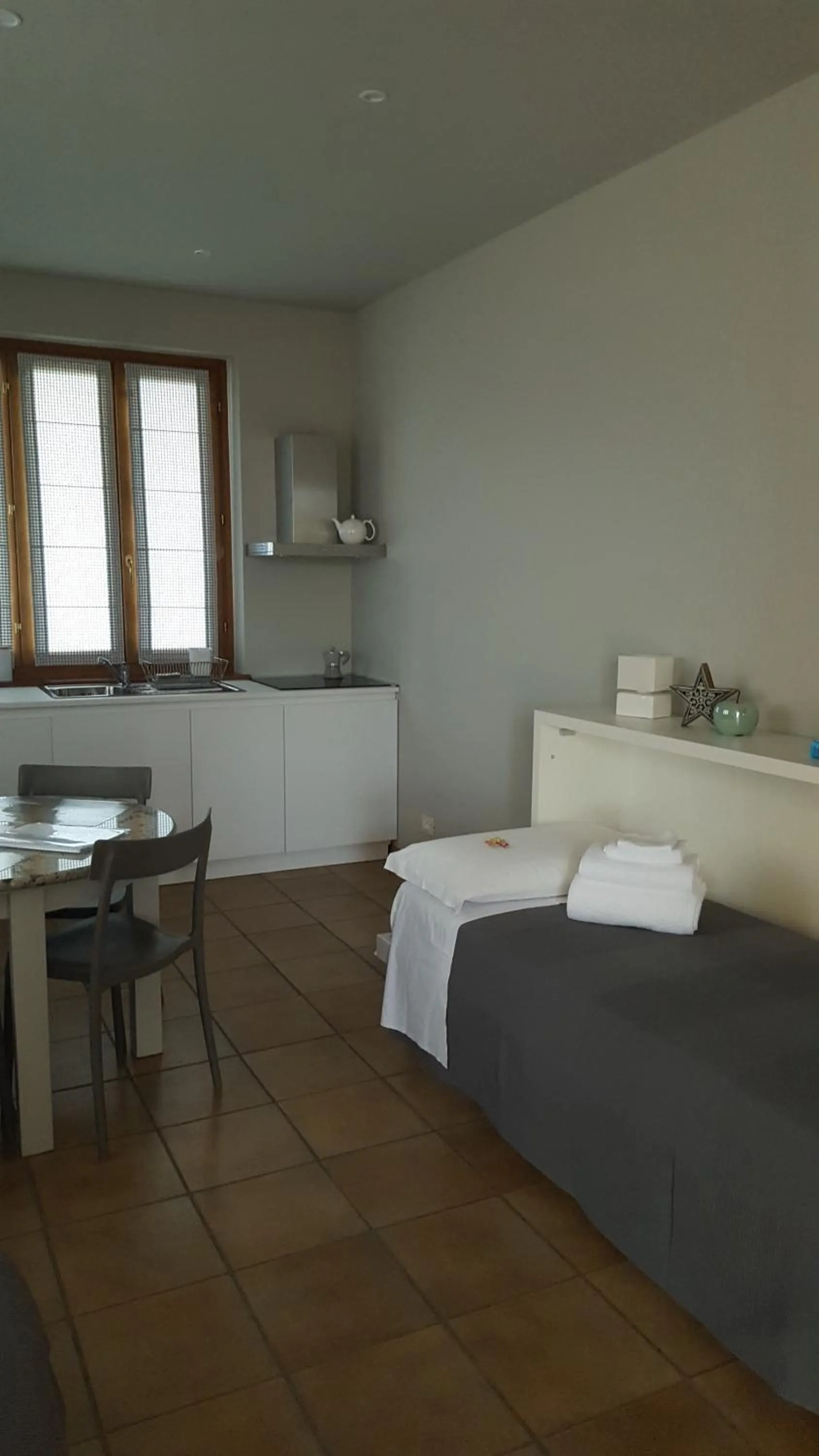 Bed in LE SETTE VIE HOLIDAY HOMES