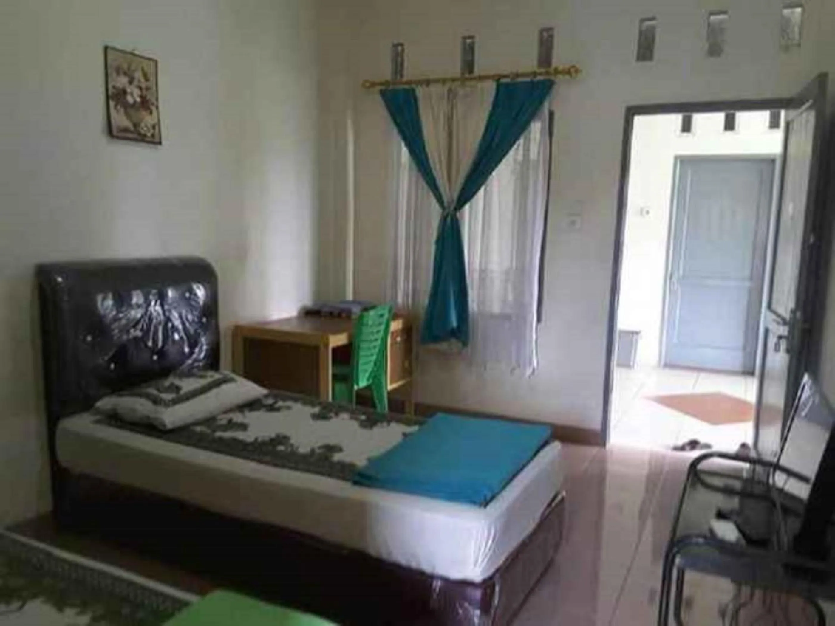 Seating area, Bed in Penginapan Syariah