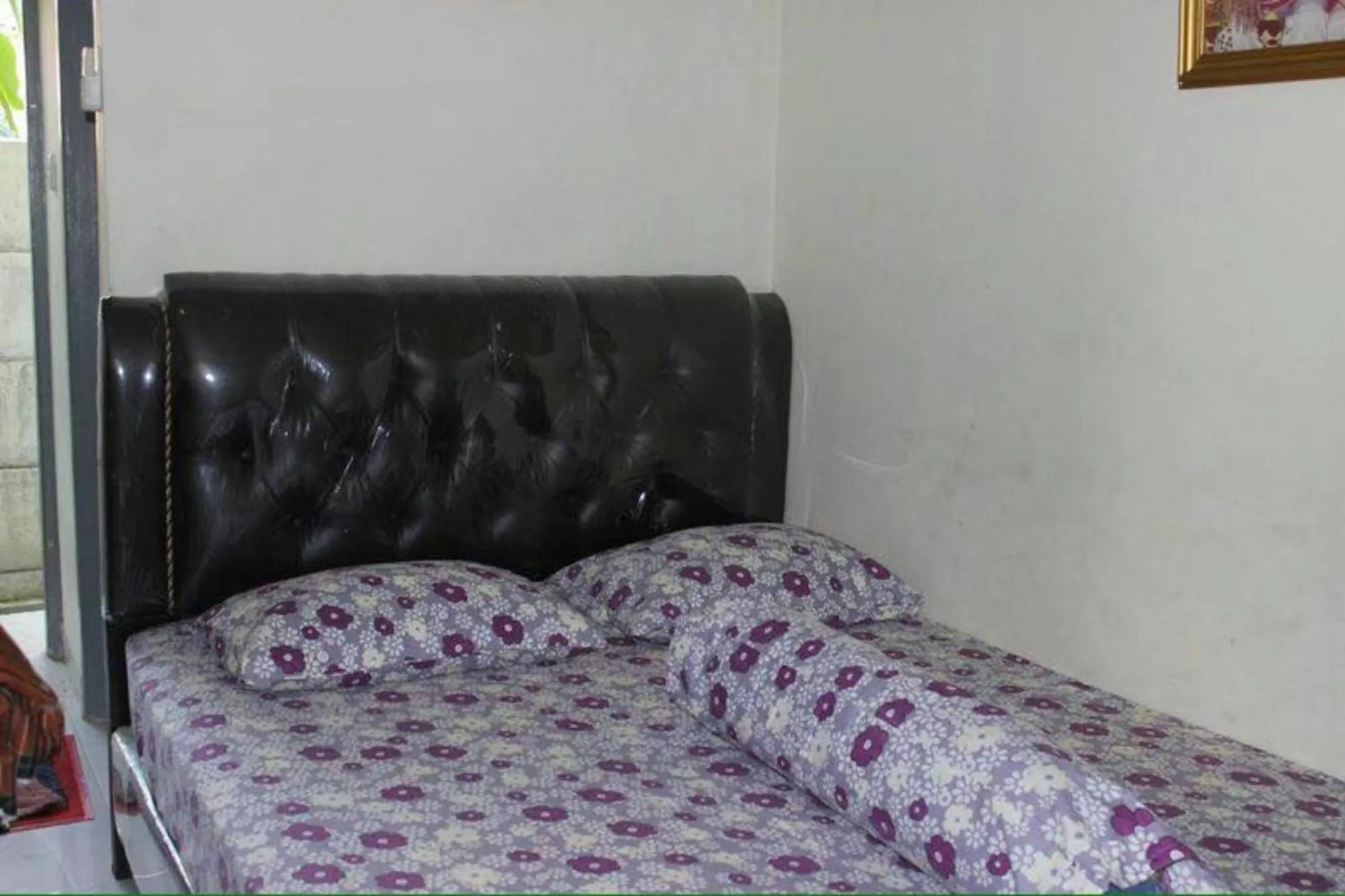 Seating area, Bed in Penginapan Syariah