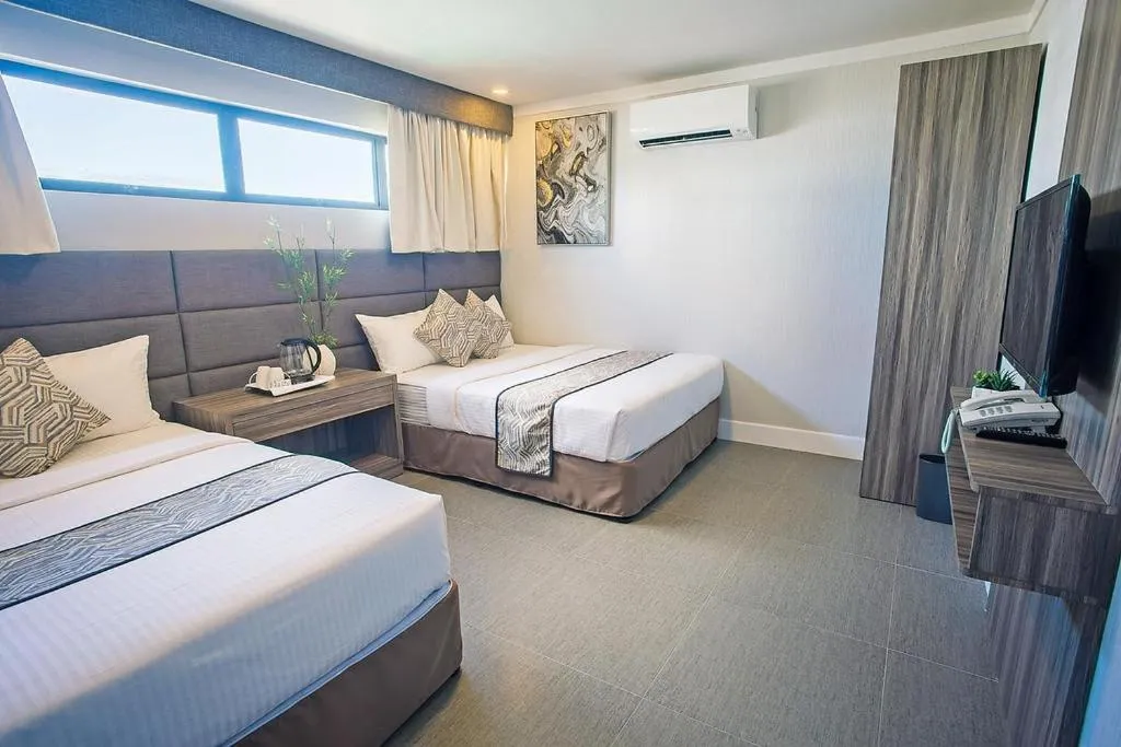 Bed in Anika Suites