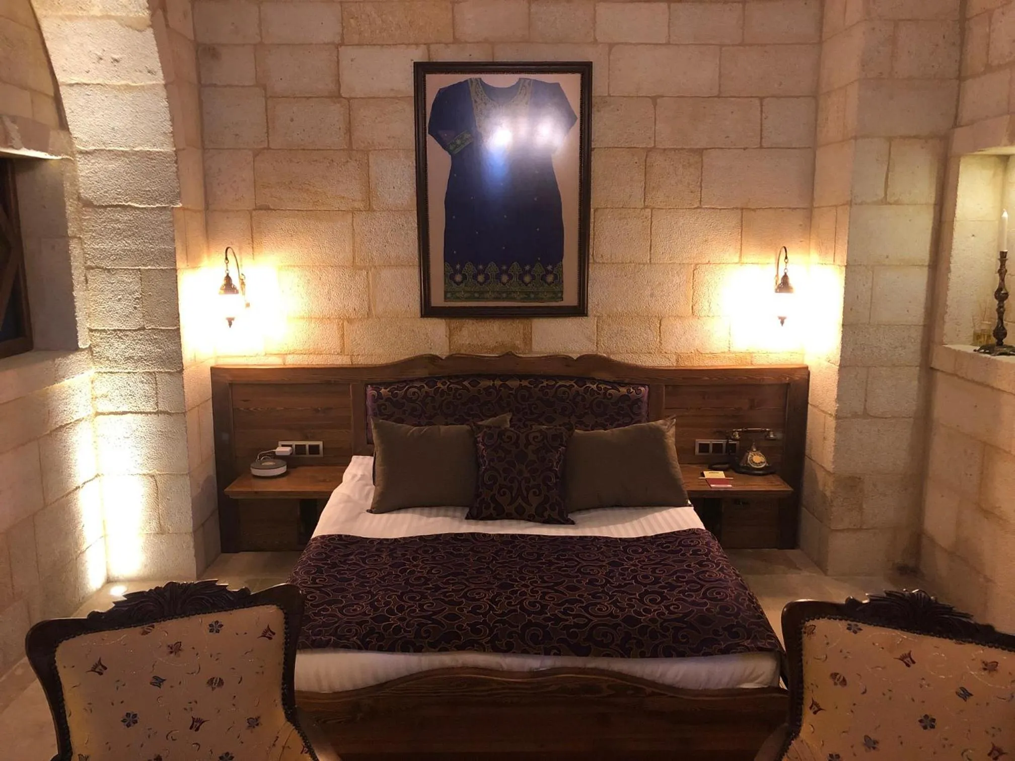 Bed in Kayakapi Premium Caves Cappadocia