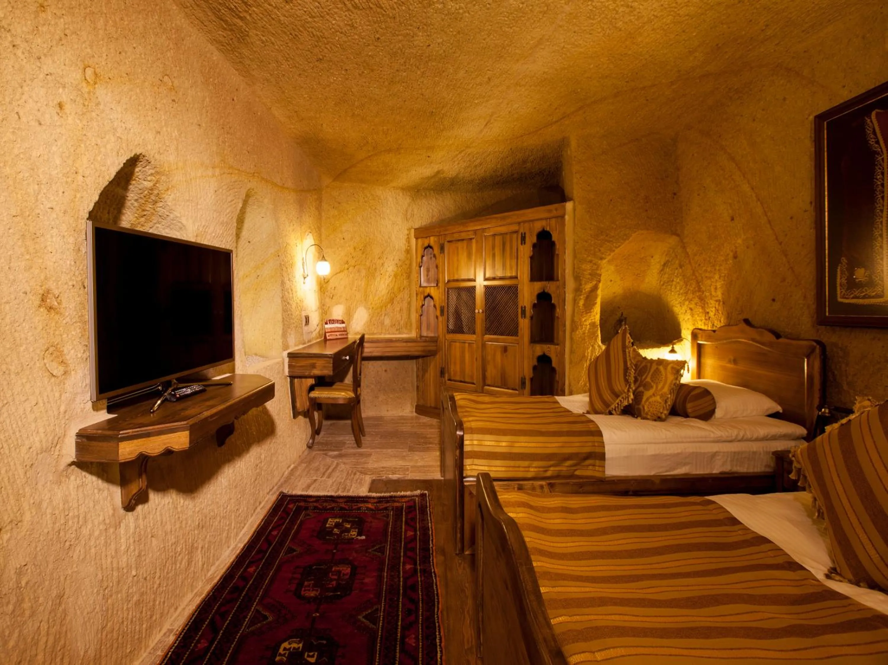 TV and multimedia, Bed in Kayakapi Premium Caves Cappadocia