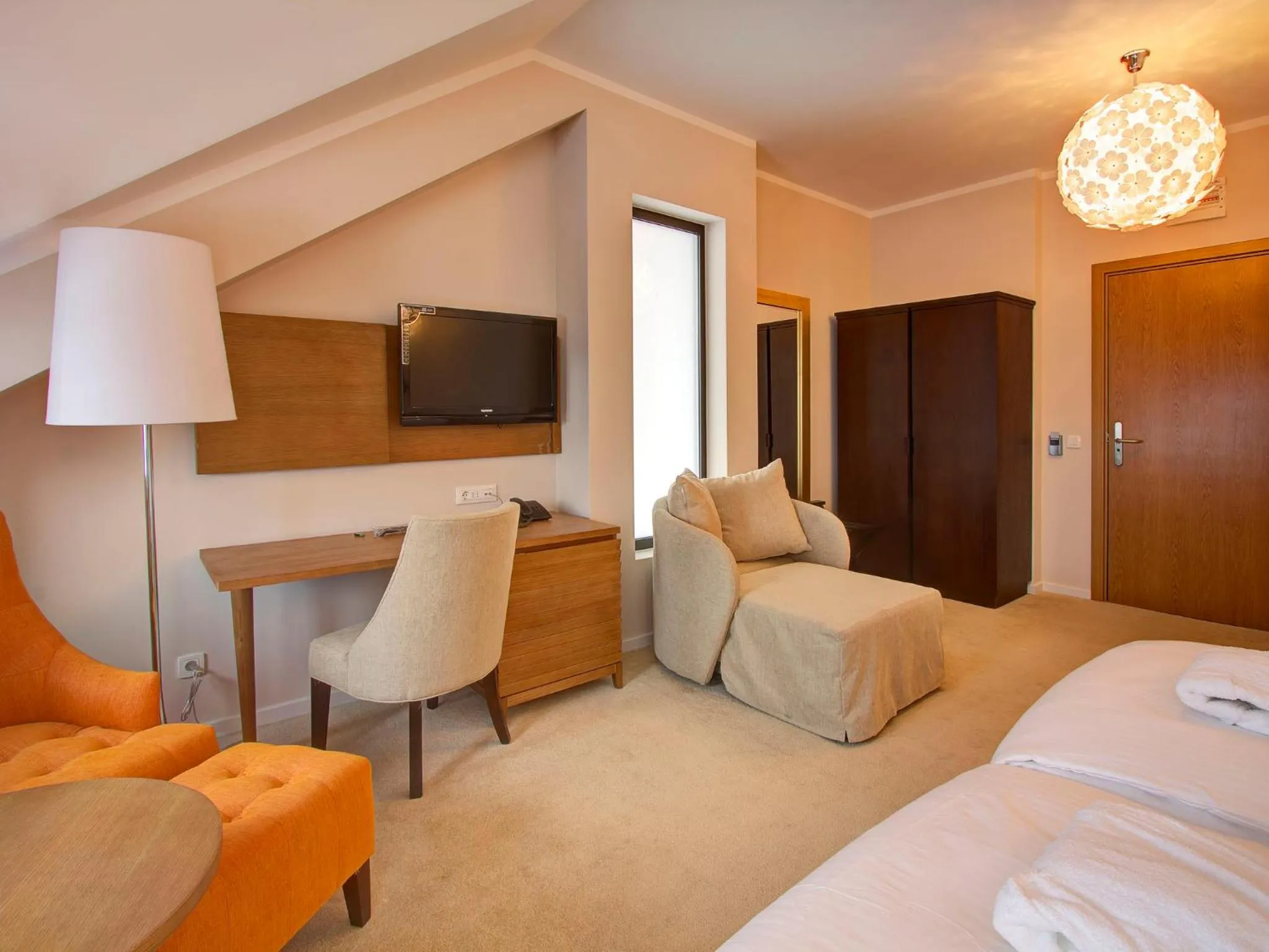 Seating area, Bed in Hotel MIR