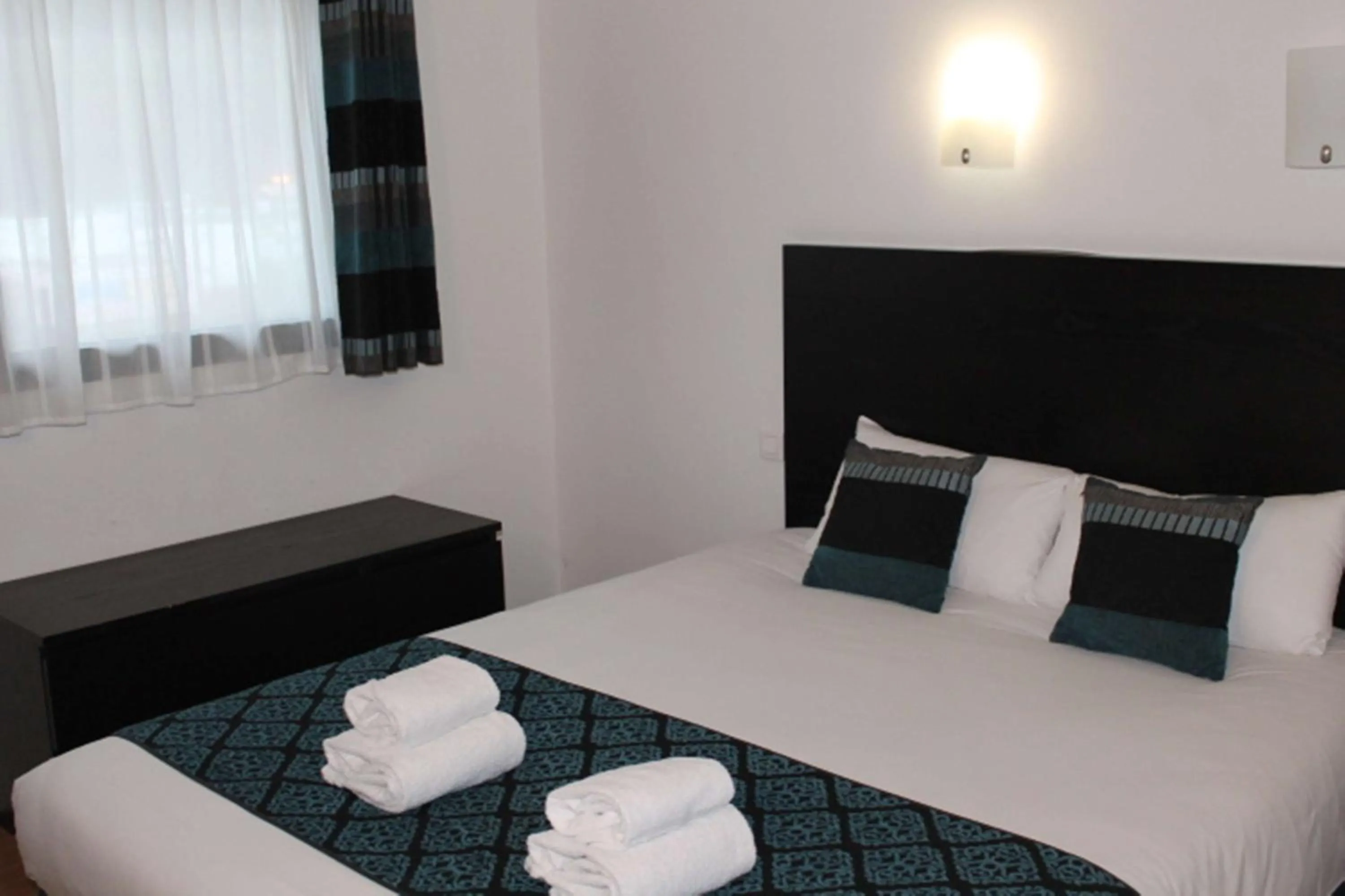 Bedroom in Brit Hotel MOTEL - Lyon L'Arbresle