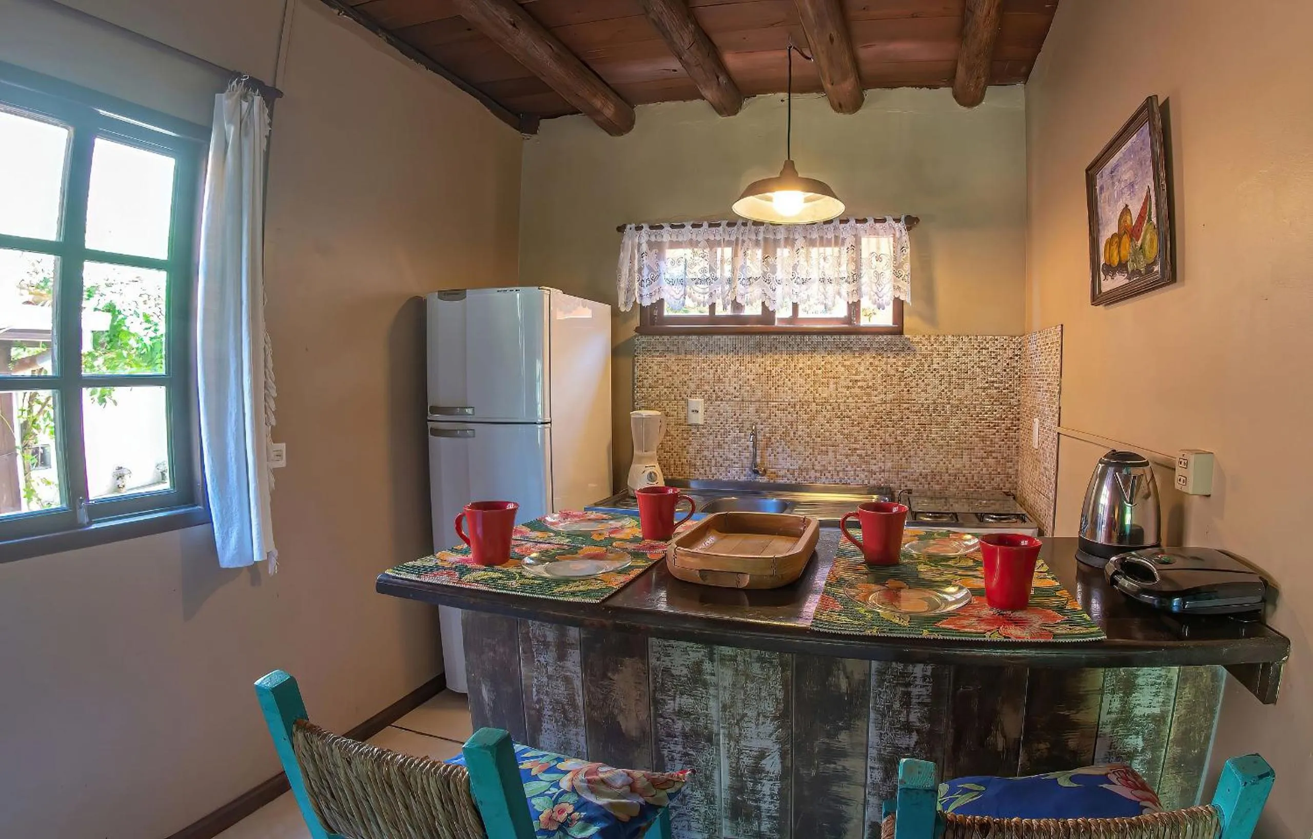 Kitchen or kitchenette in Pousada Rosa da Praia - Praia do Rosa - SC