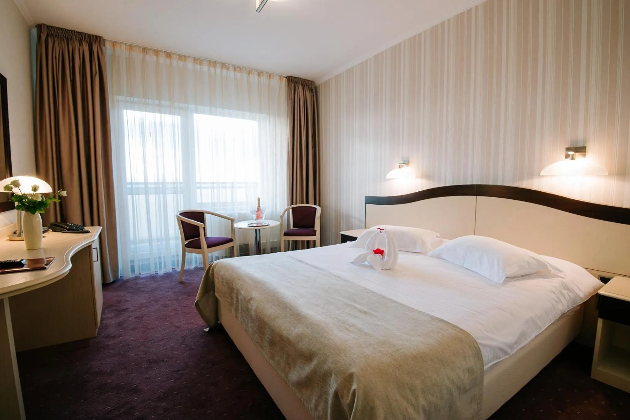 Bed in Caprioara Spa&Wellness Resort