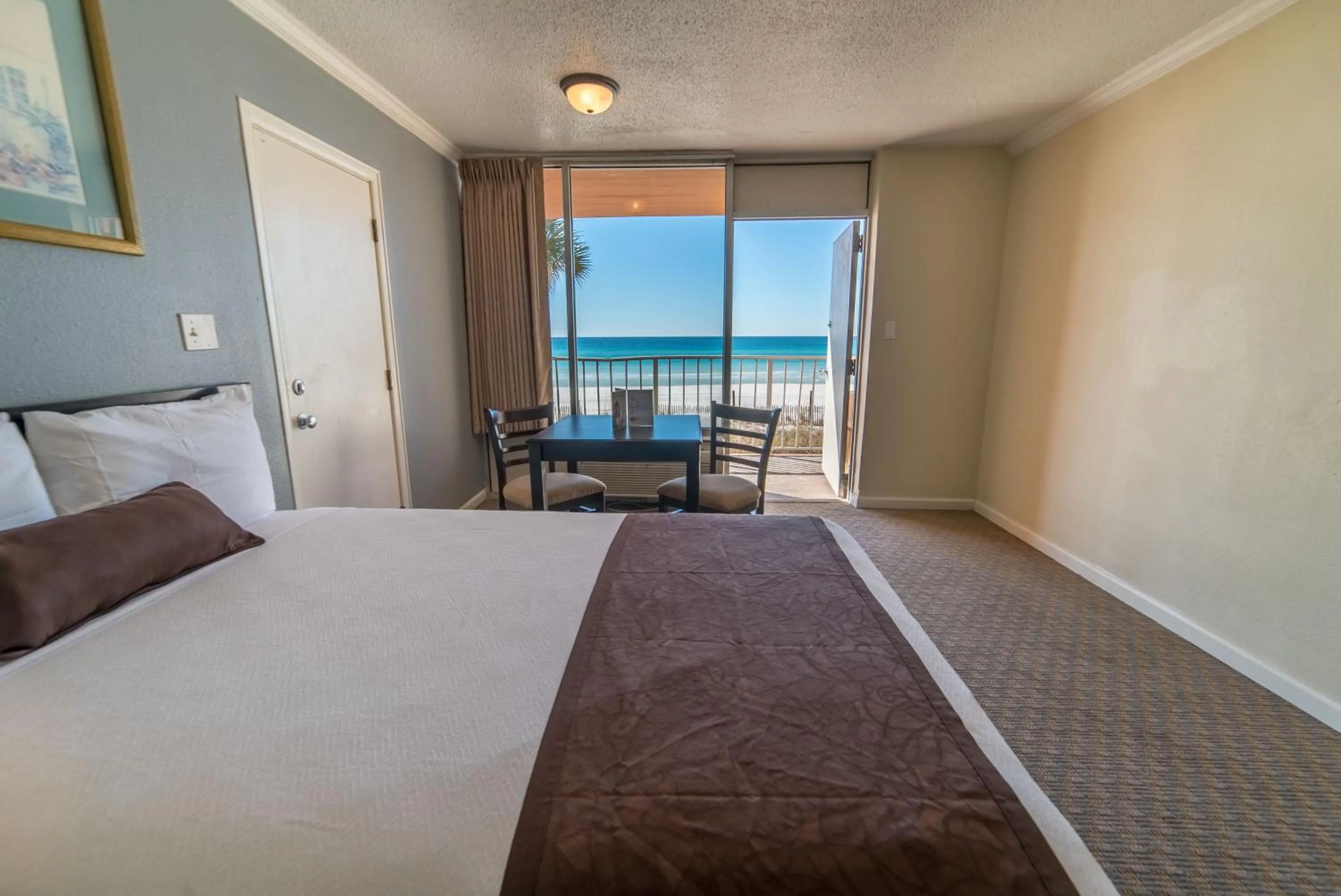 Balcony/Terrace, Bed in Seahaven Beach Hotel Panama City Beach