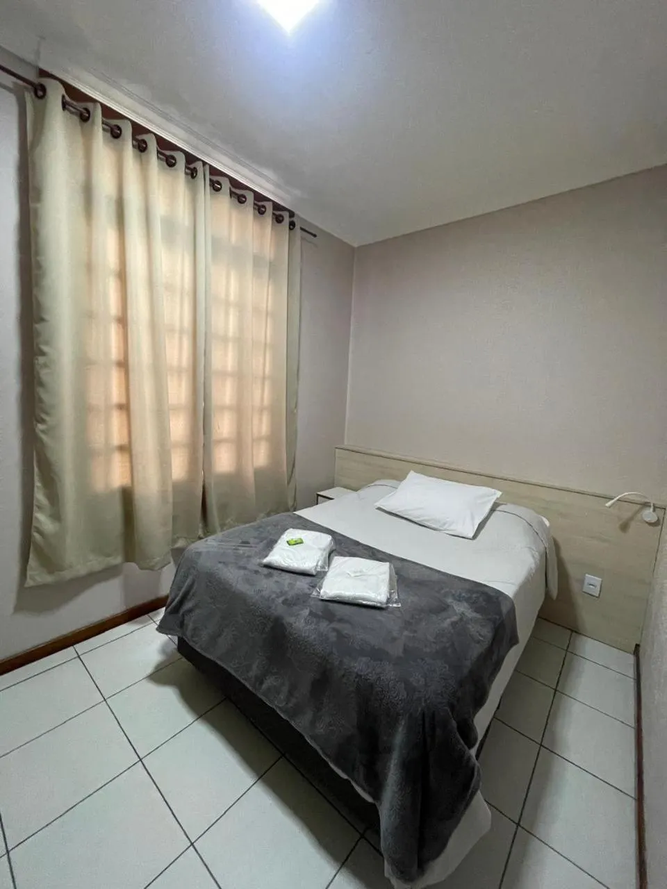 Bed in Hotel Villa Souza Ltda