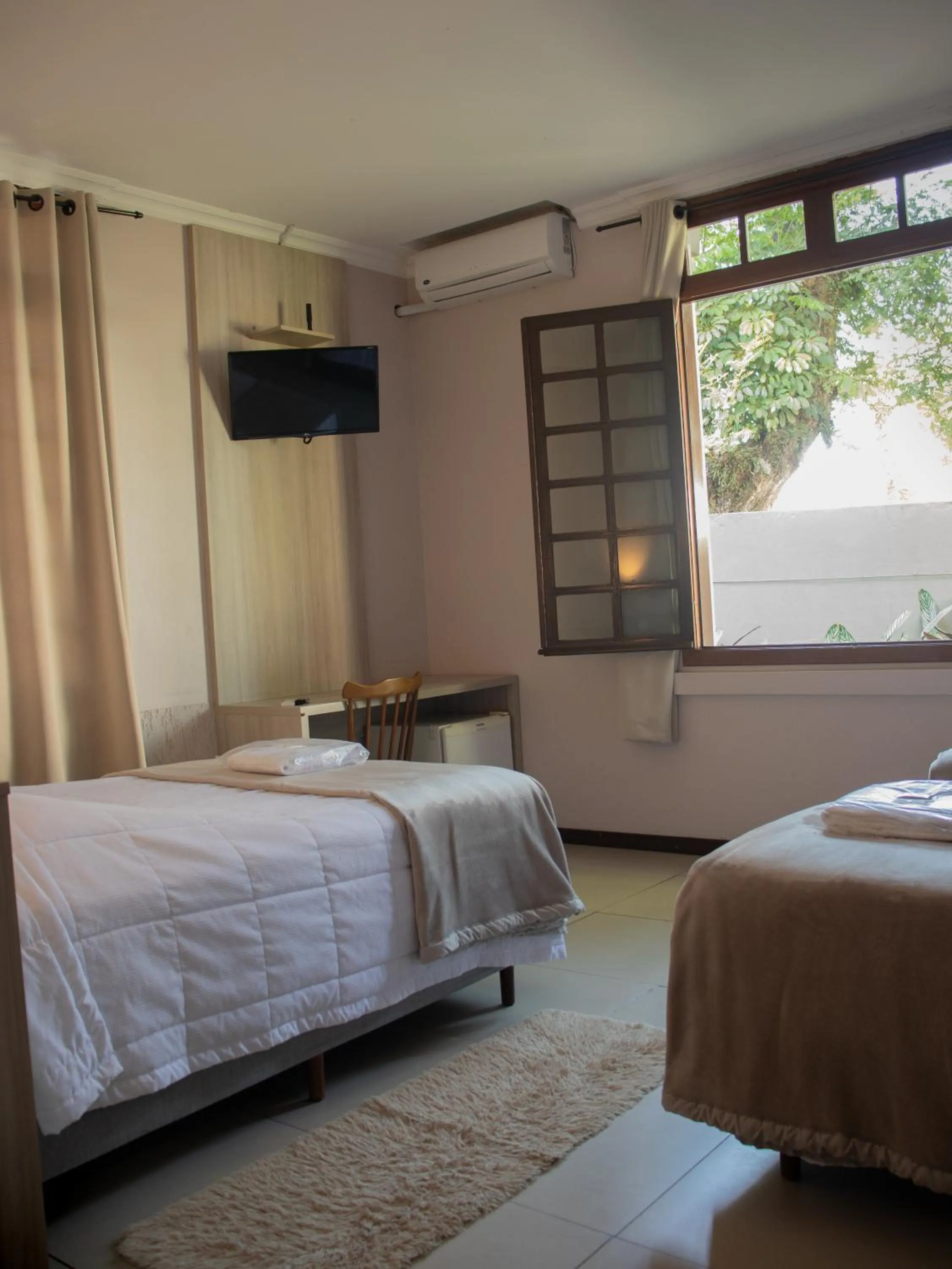 Photo of the whole room, Bed in Hotel Villa Souza Ltda