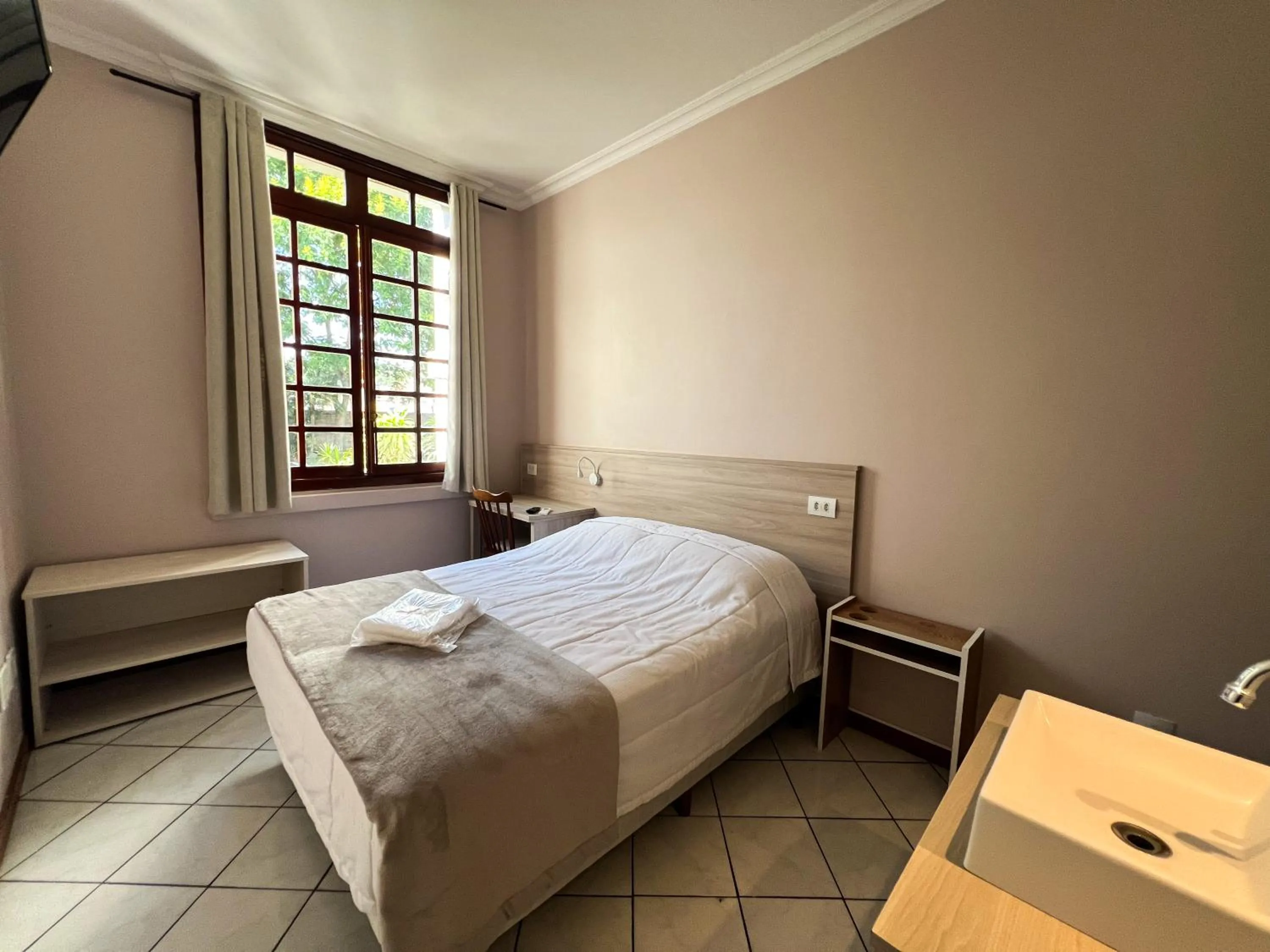 Bedroom, Bed in Hotel Villa Souza Ltda