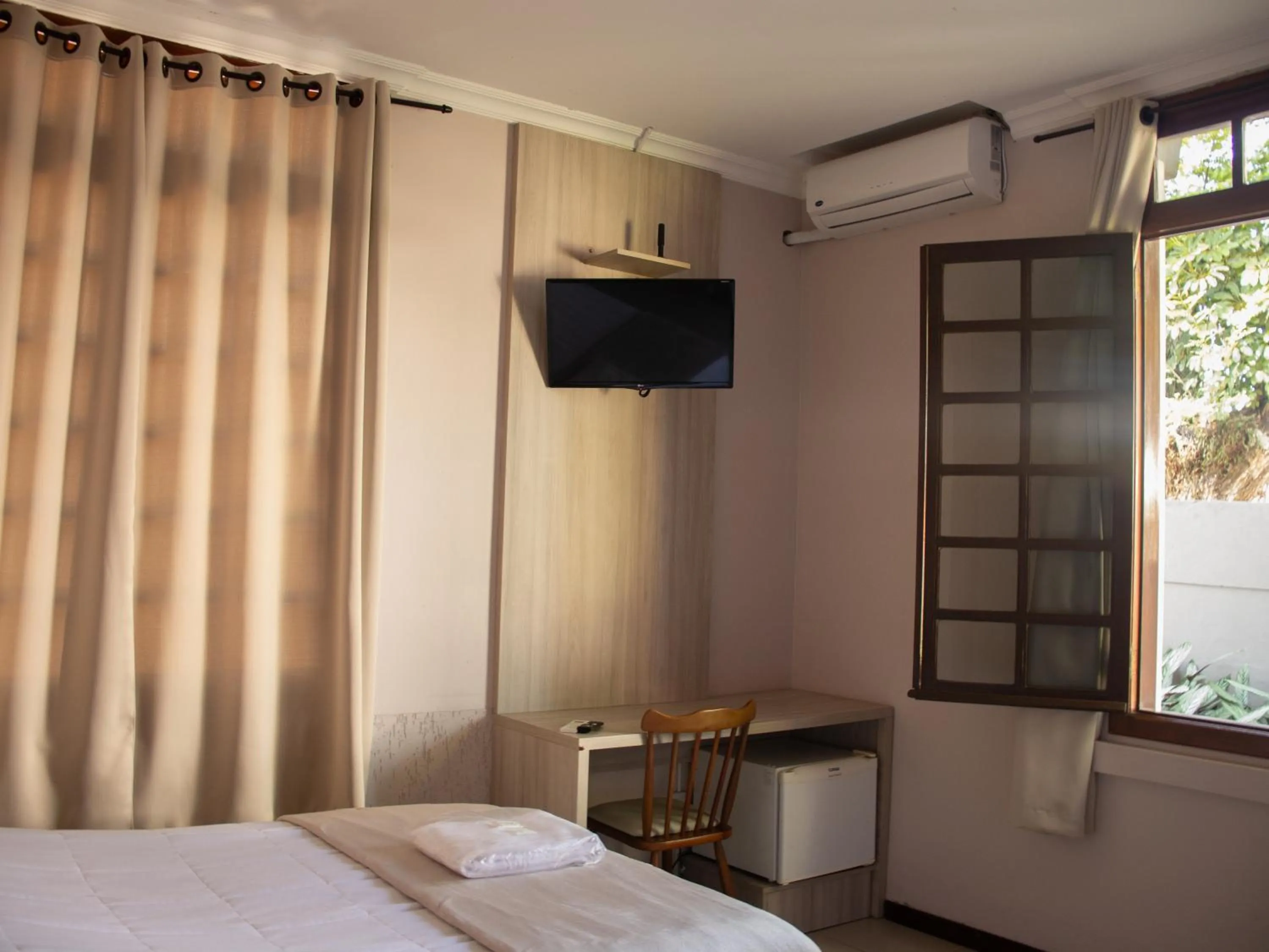 TV and multimedia, Bed in Hotel Villa Souza Ltda