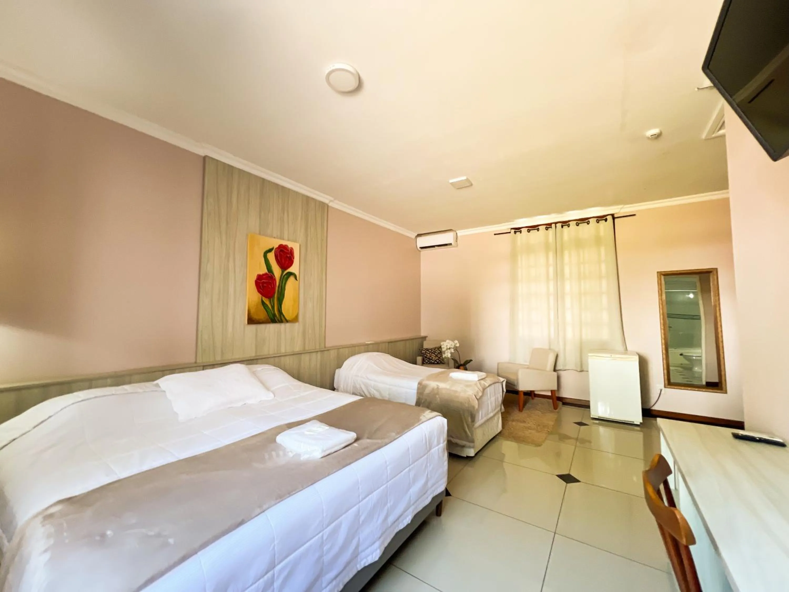 Bed in Hotel Villa Souza Ltda