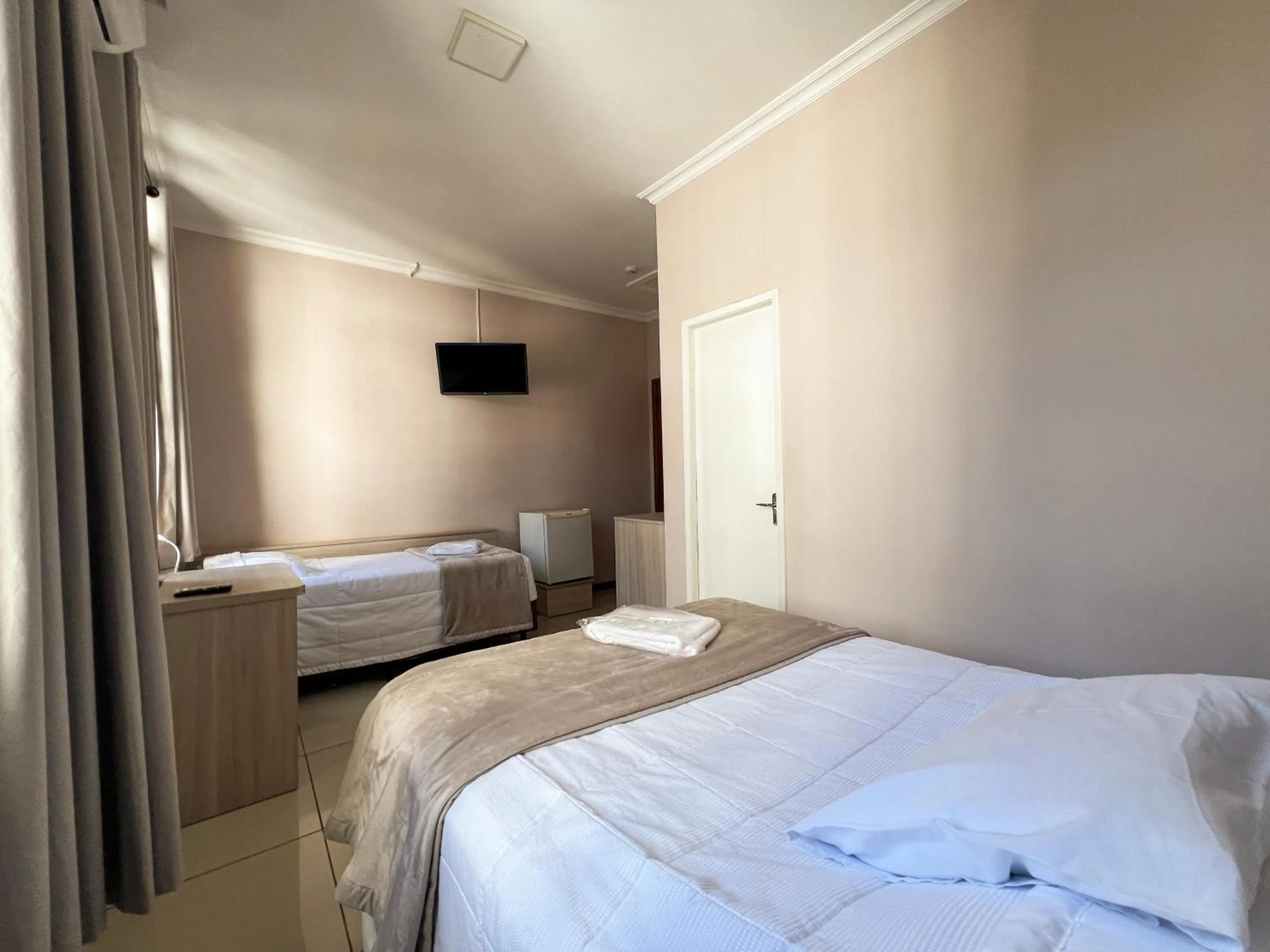 Photo of the whole room, Bed in Hotel Villa Souza Ltda