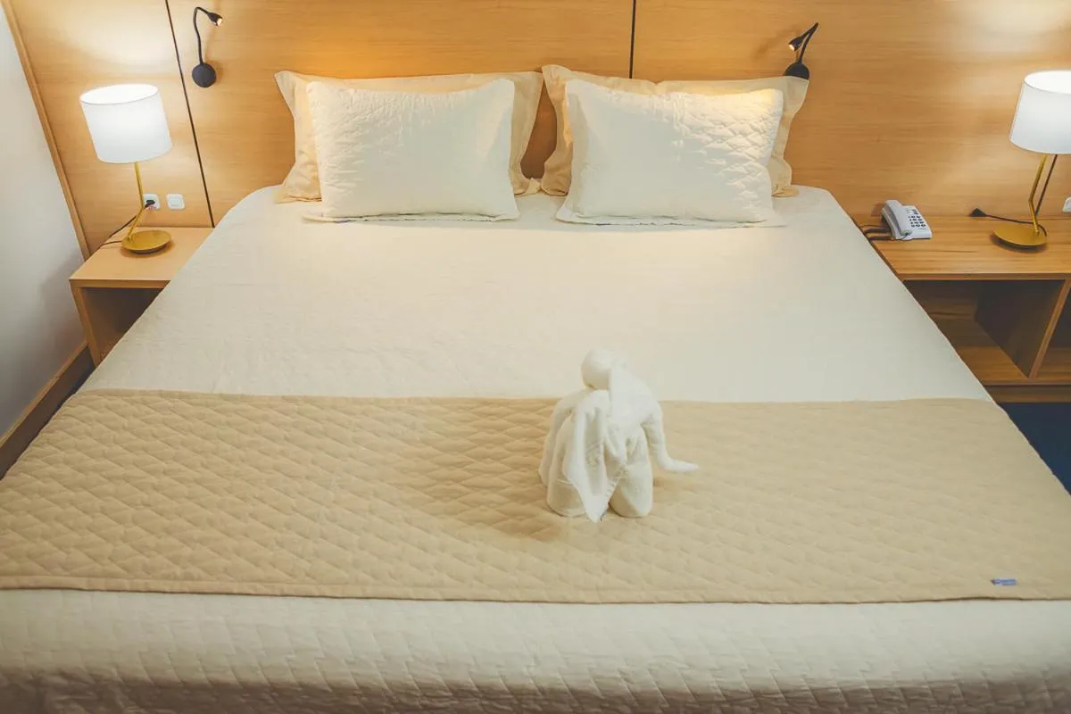 Bed in Grande Hotel Guarapuava