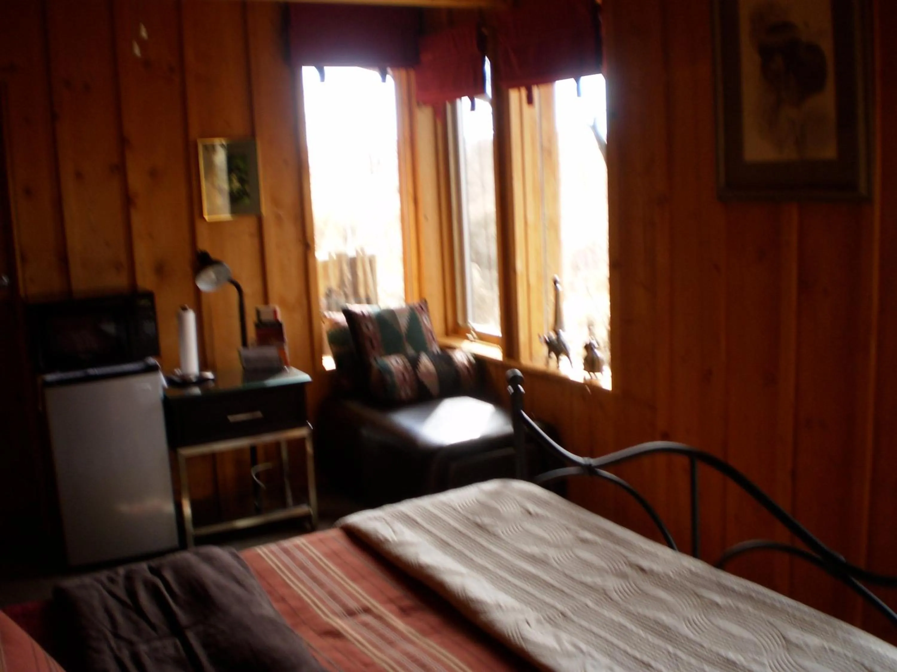 Bed in Silver River Adobe Inn Bed and Breakfast