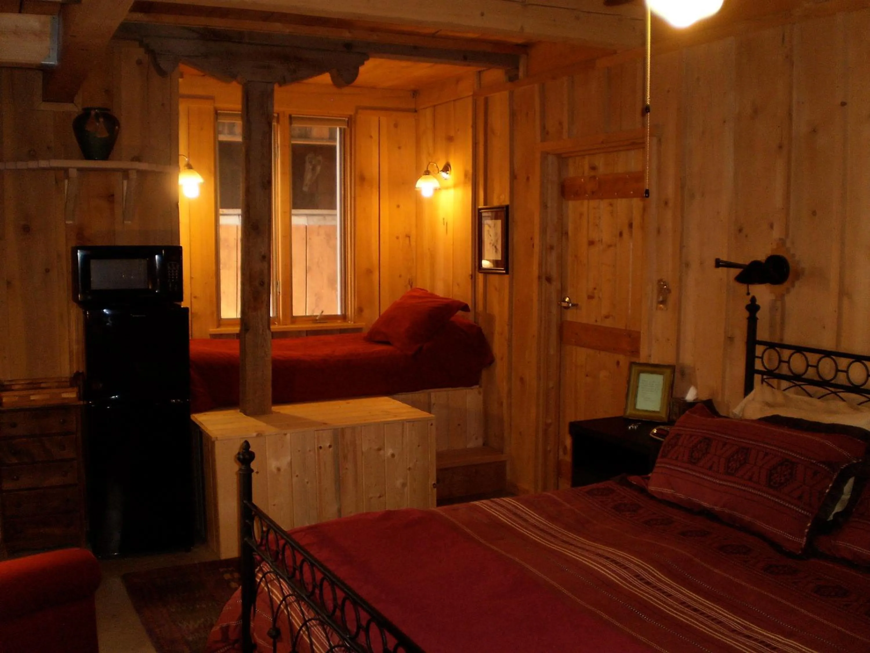 Bed in Silver River Adobe Inn Bed and Breakfast