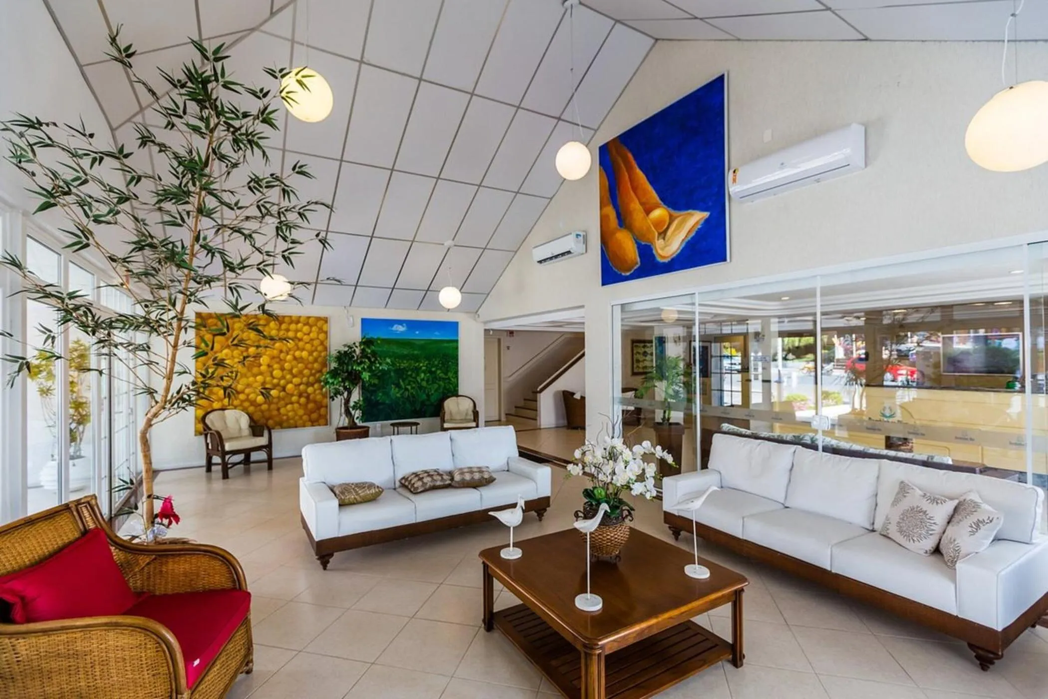 Seating area in Bombinhas Blue Suítes