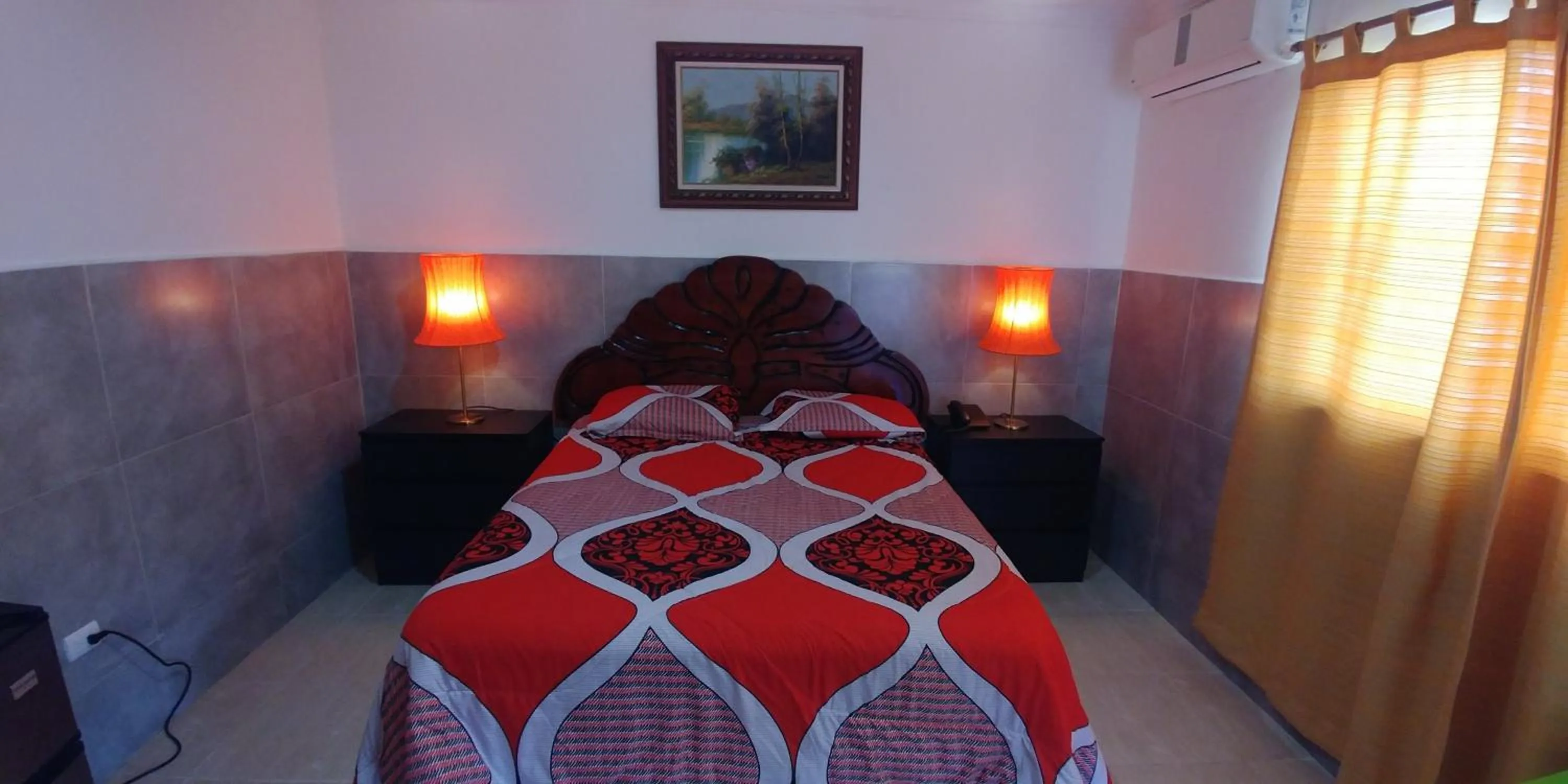 Bed in Hotel Riparbella