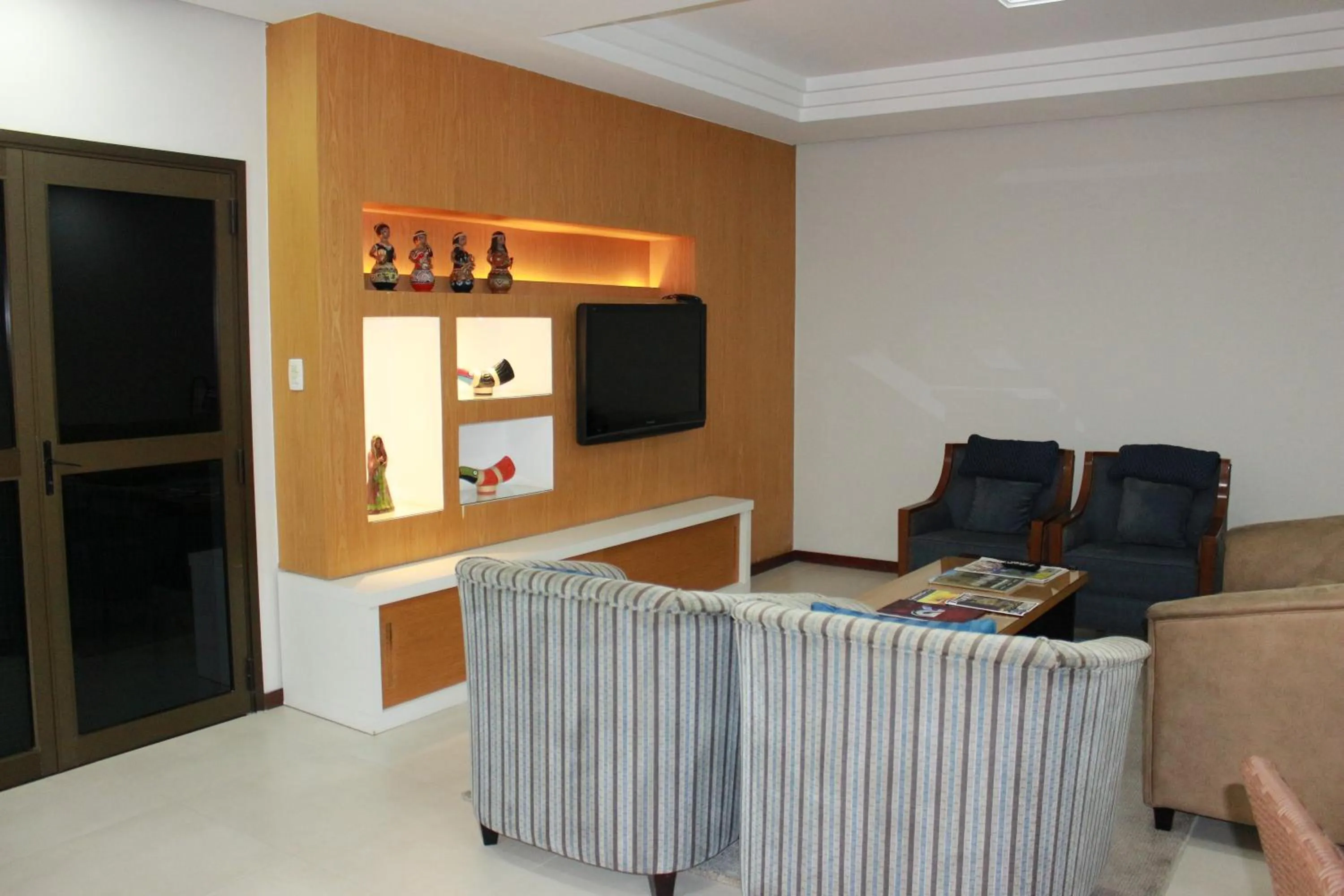 Communal lounge/ TV room in Brumado Hotel