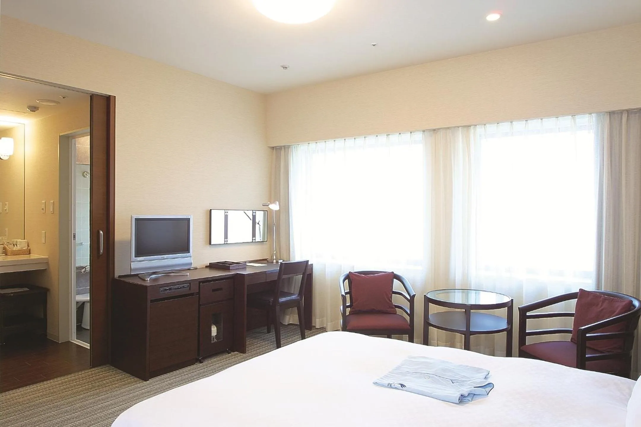 Photo of the whole room, Bed in Centrair Hotel