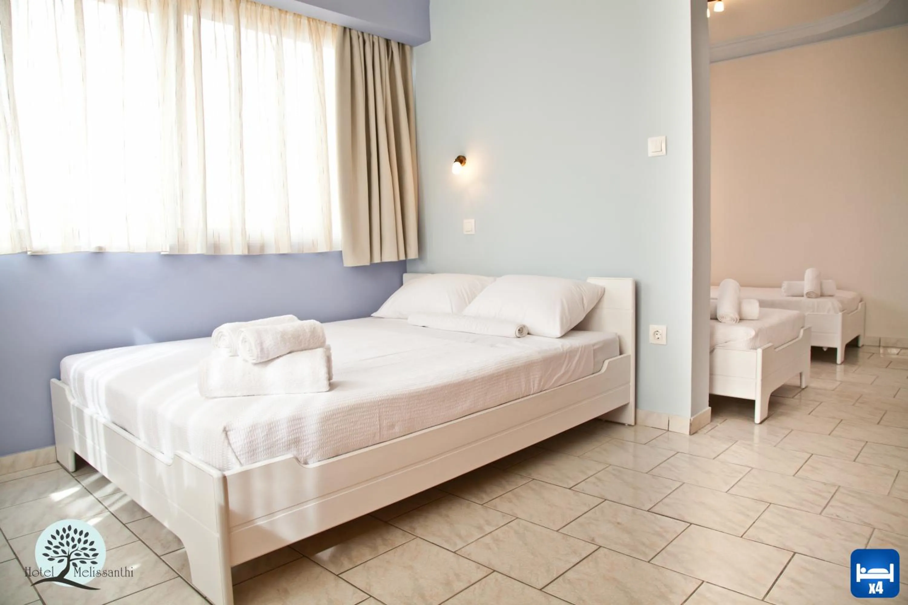 Bed in Hotel Melissanthi