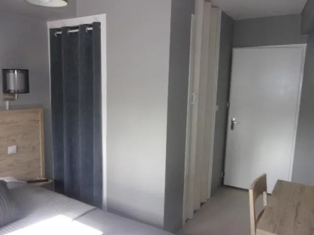 Bed in Hôtel Le Cerizay