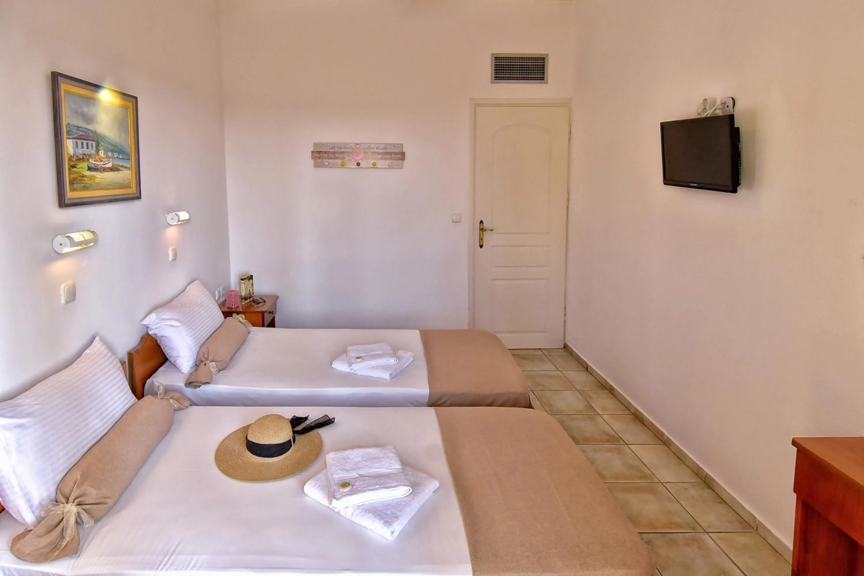 Bed in Aspri Petra Apartments