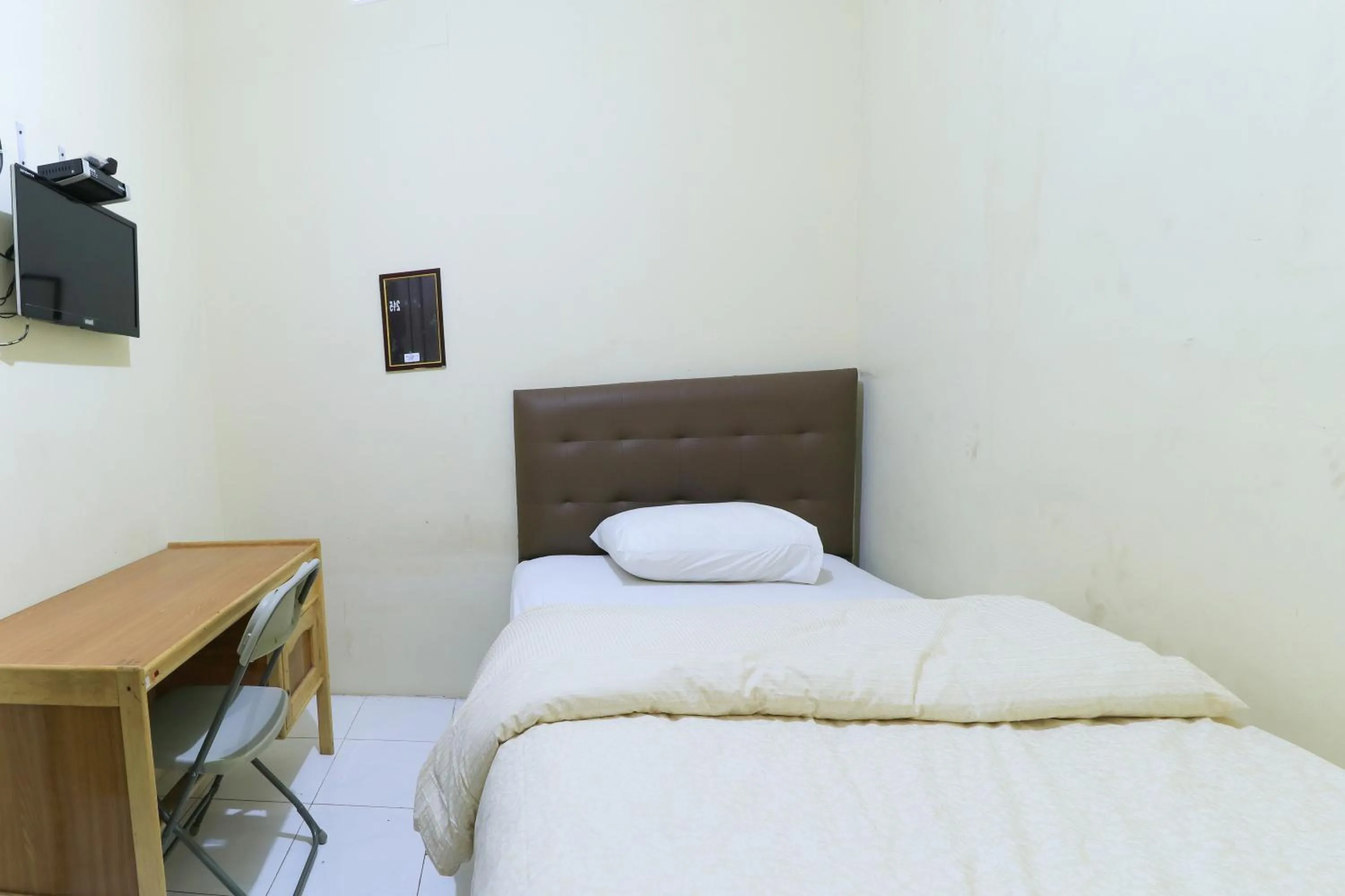 Bed in Guest House Samarinda