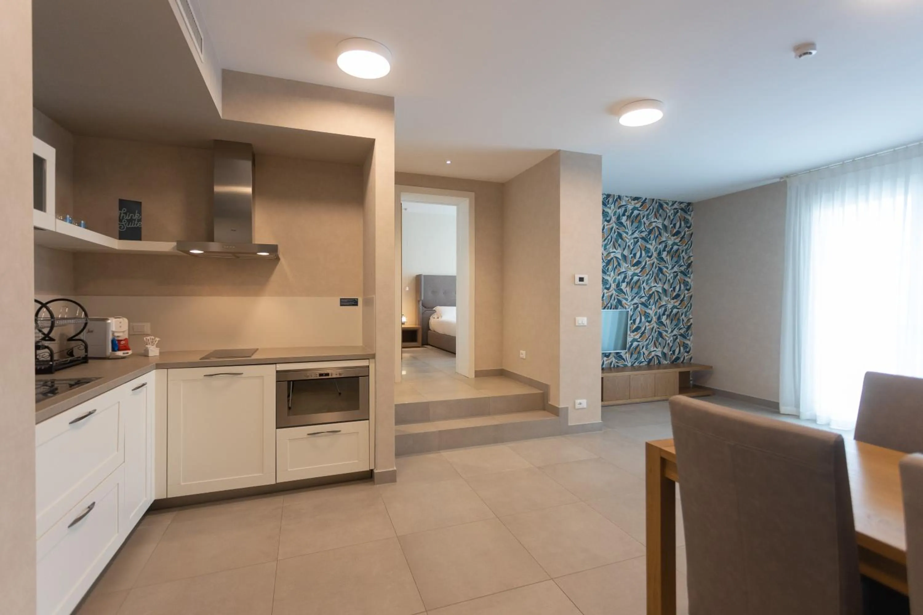 Kitchen or kitchenette in Mosella Suite Hotel