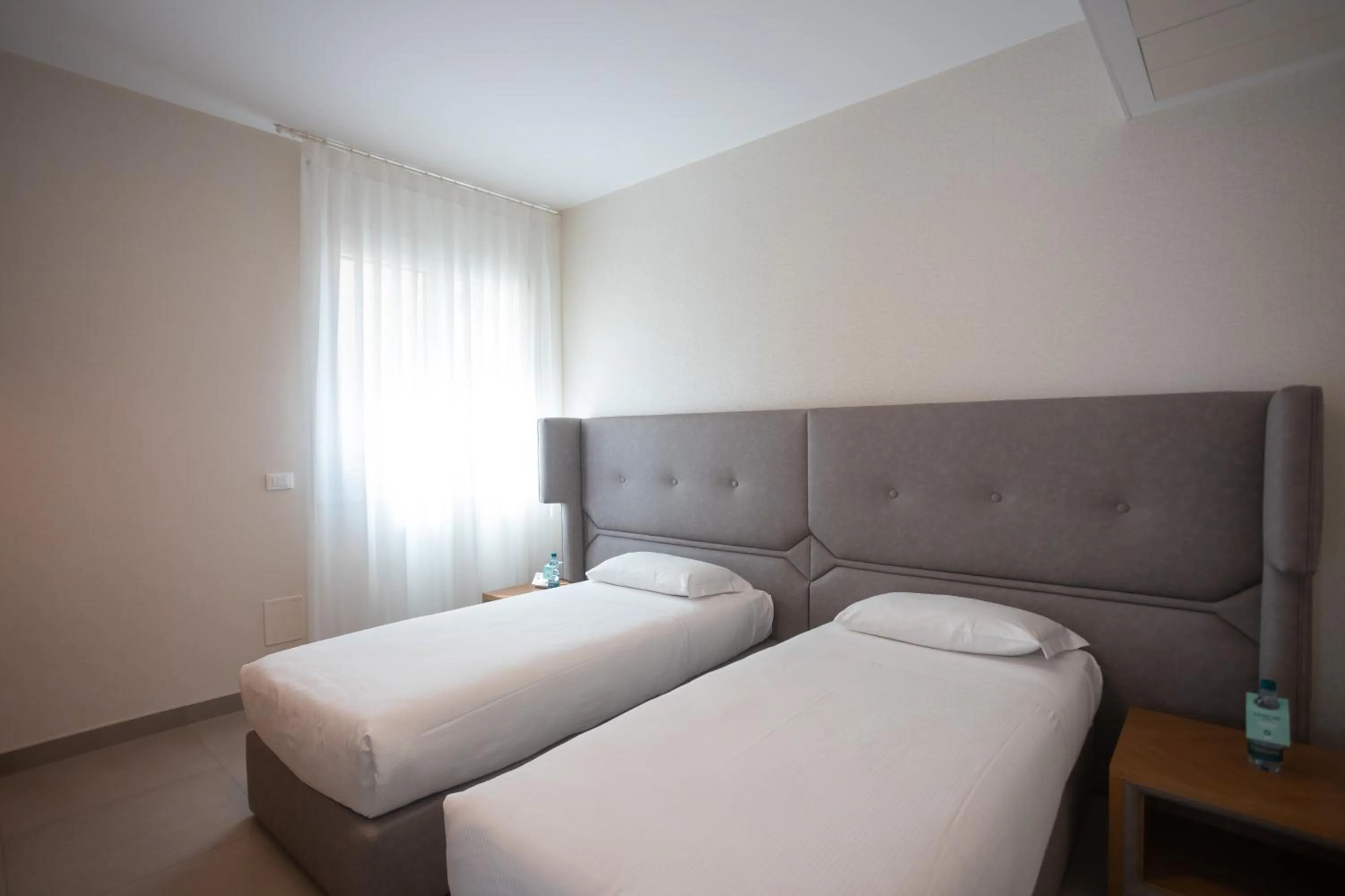 Bed in Mosella Suite Hotel