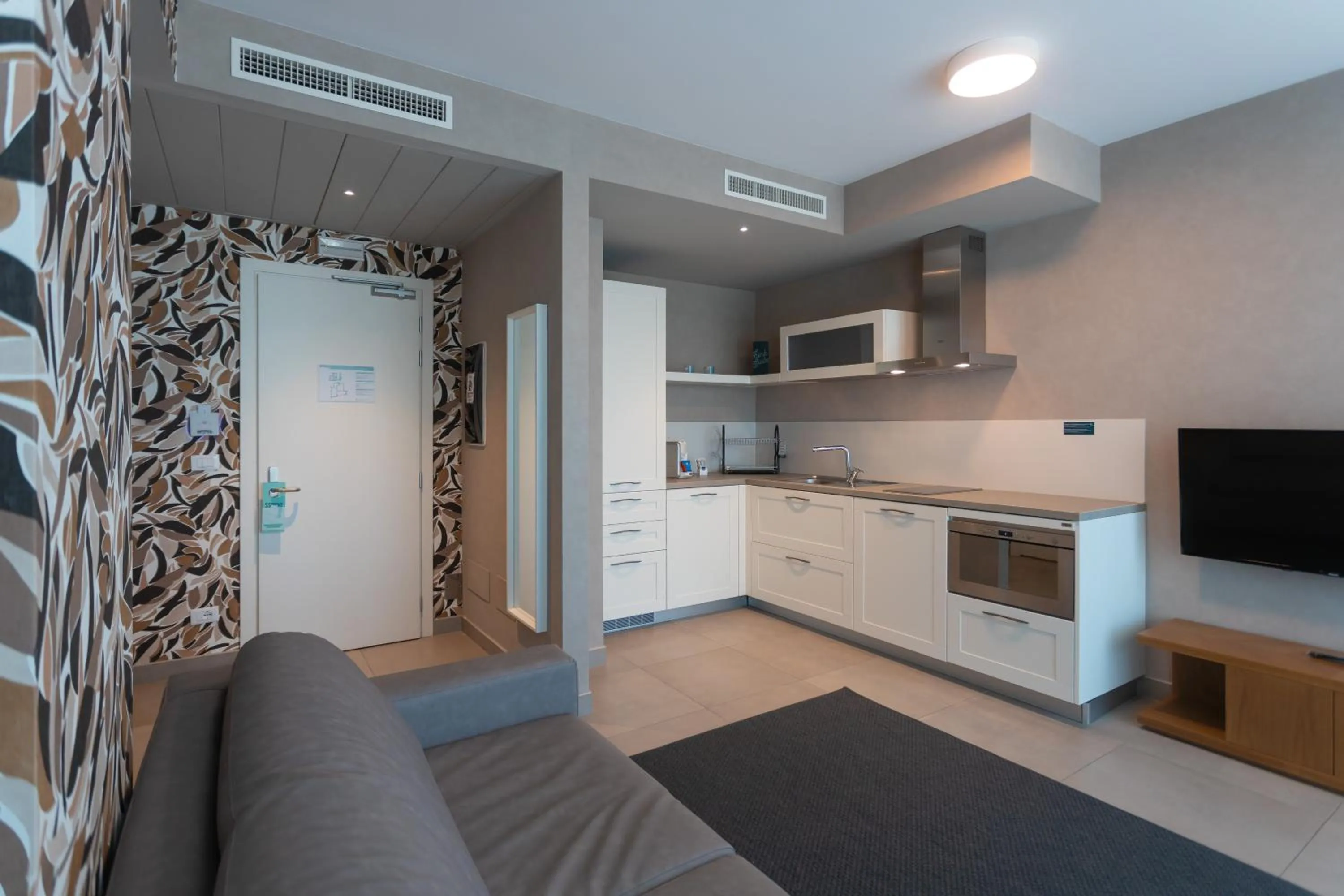 Kitchen or kitchenette in Mosella Suite Hotel