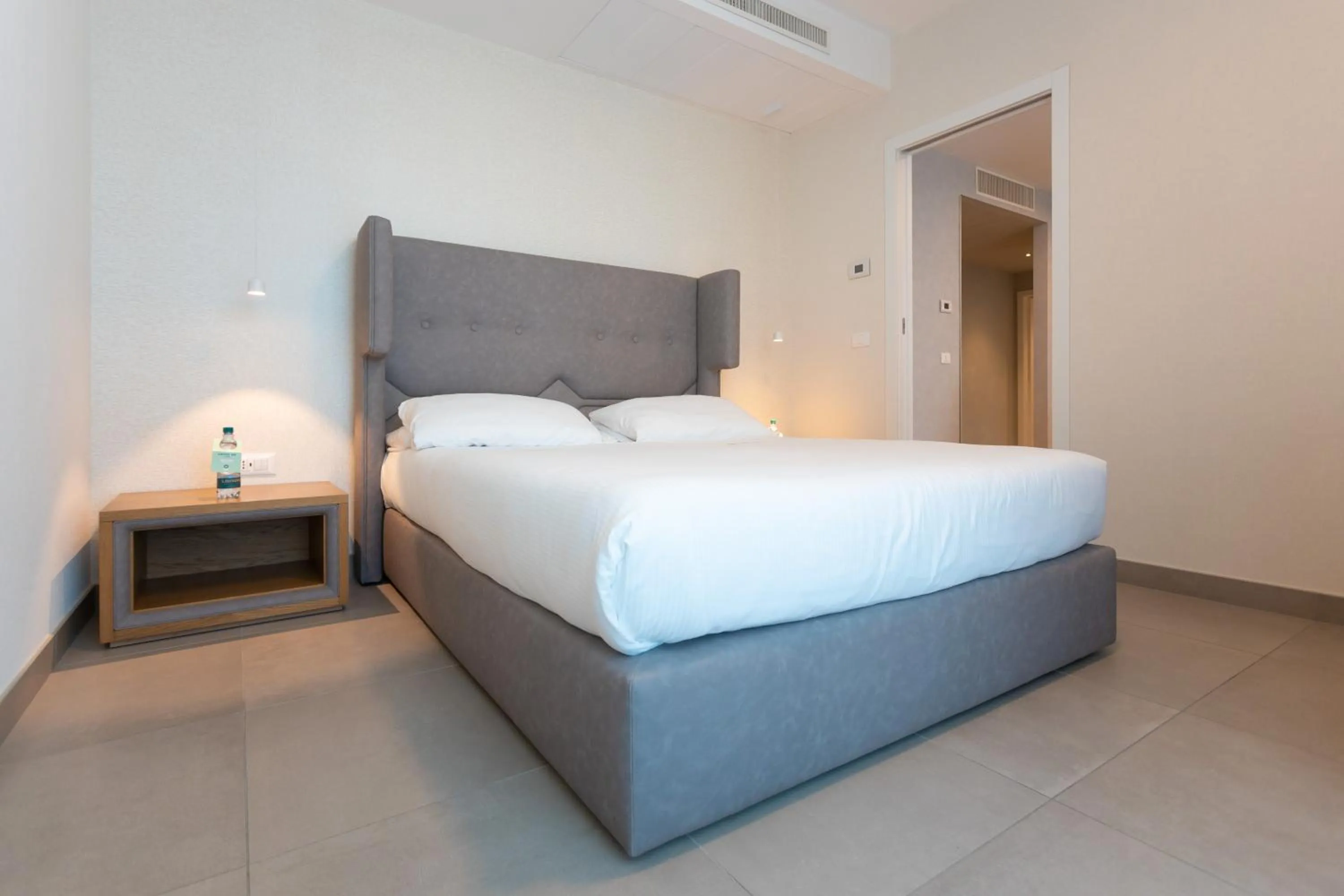 Bed in Mosella Suite Hotel