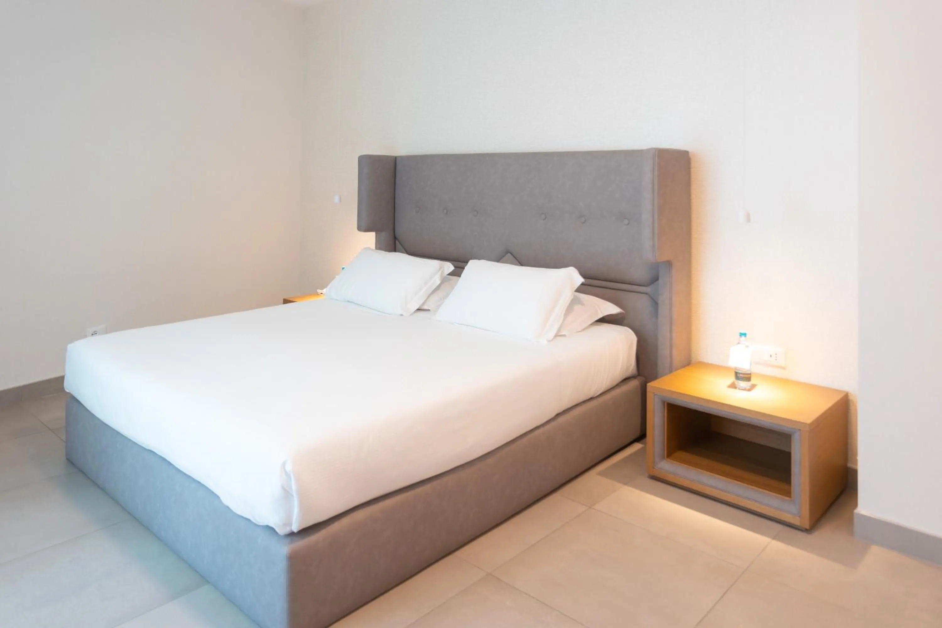 Bed in Mosella Suite Hotel