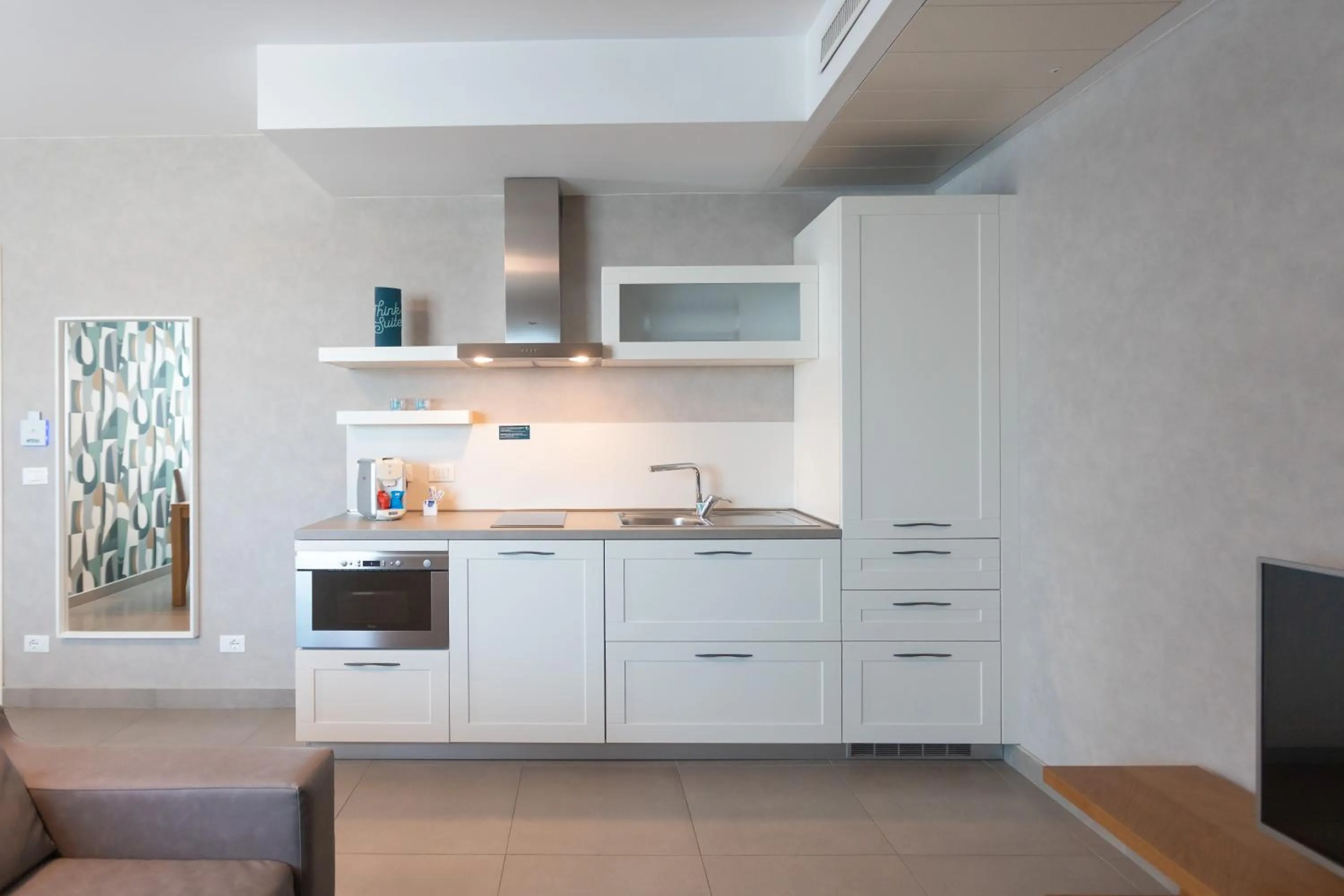 Kitchen or kitchenette in Mosella Suite Hotel