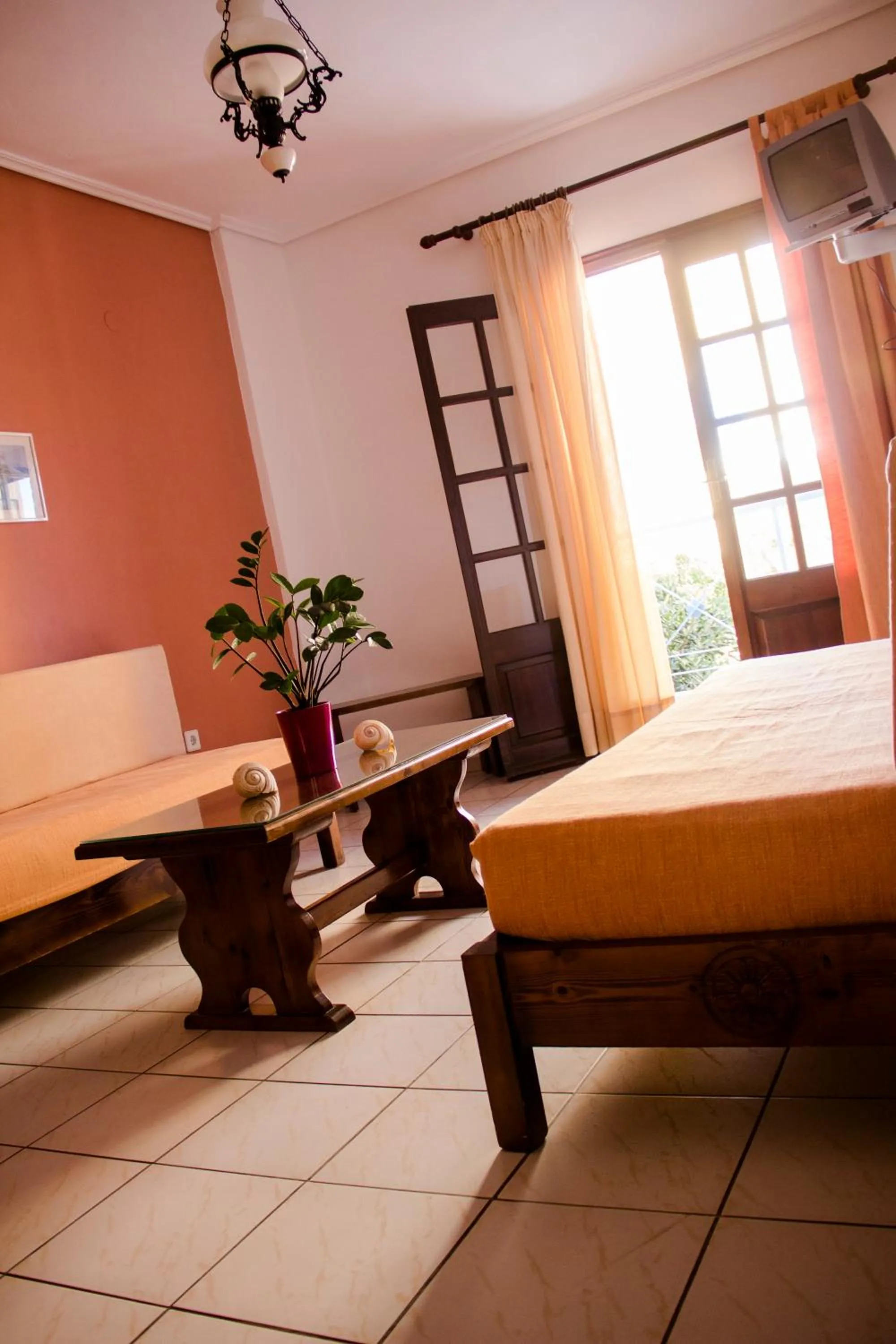 Living room, Bed in Hesperia Hotel