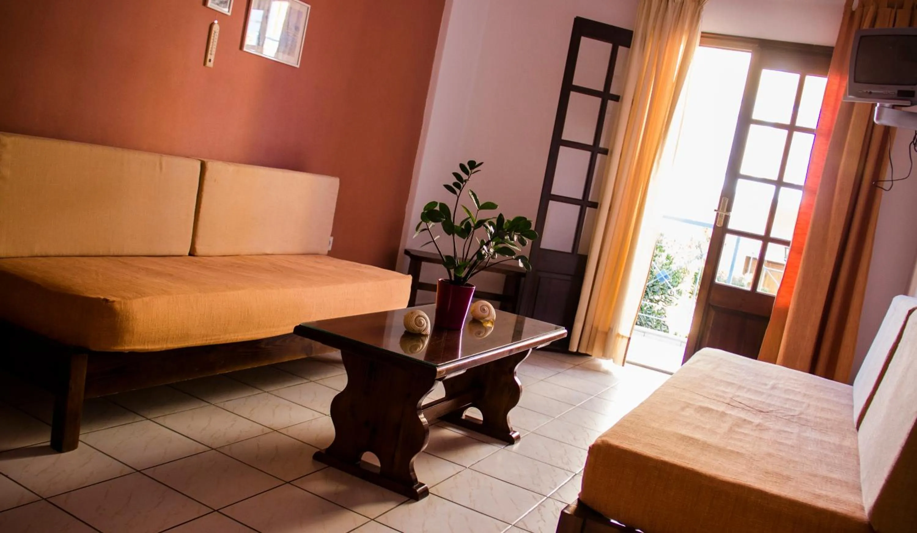 Living room, Bed in Hesperia Hotel