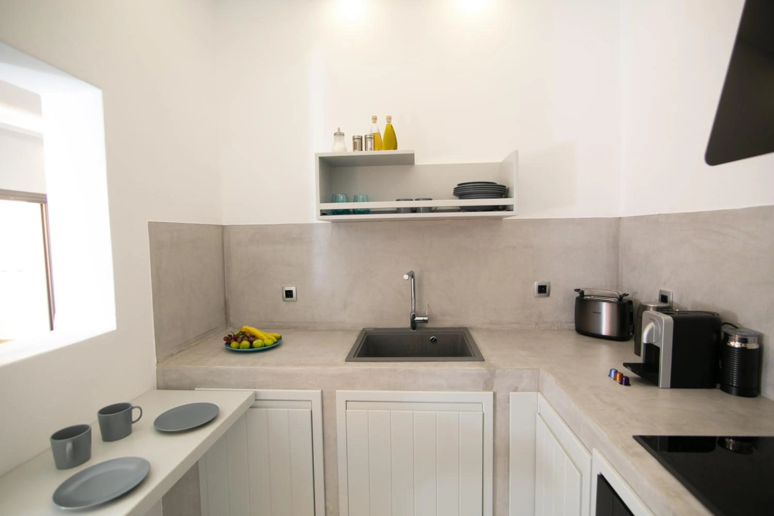 Kitchen or kitchenette in Aegean Melody Suites & Villas