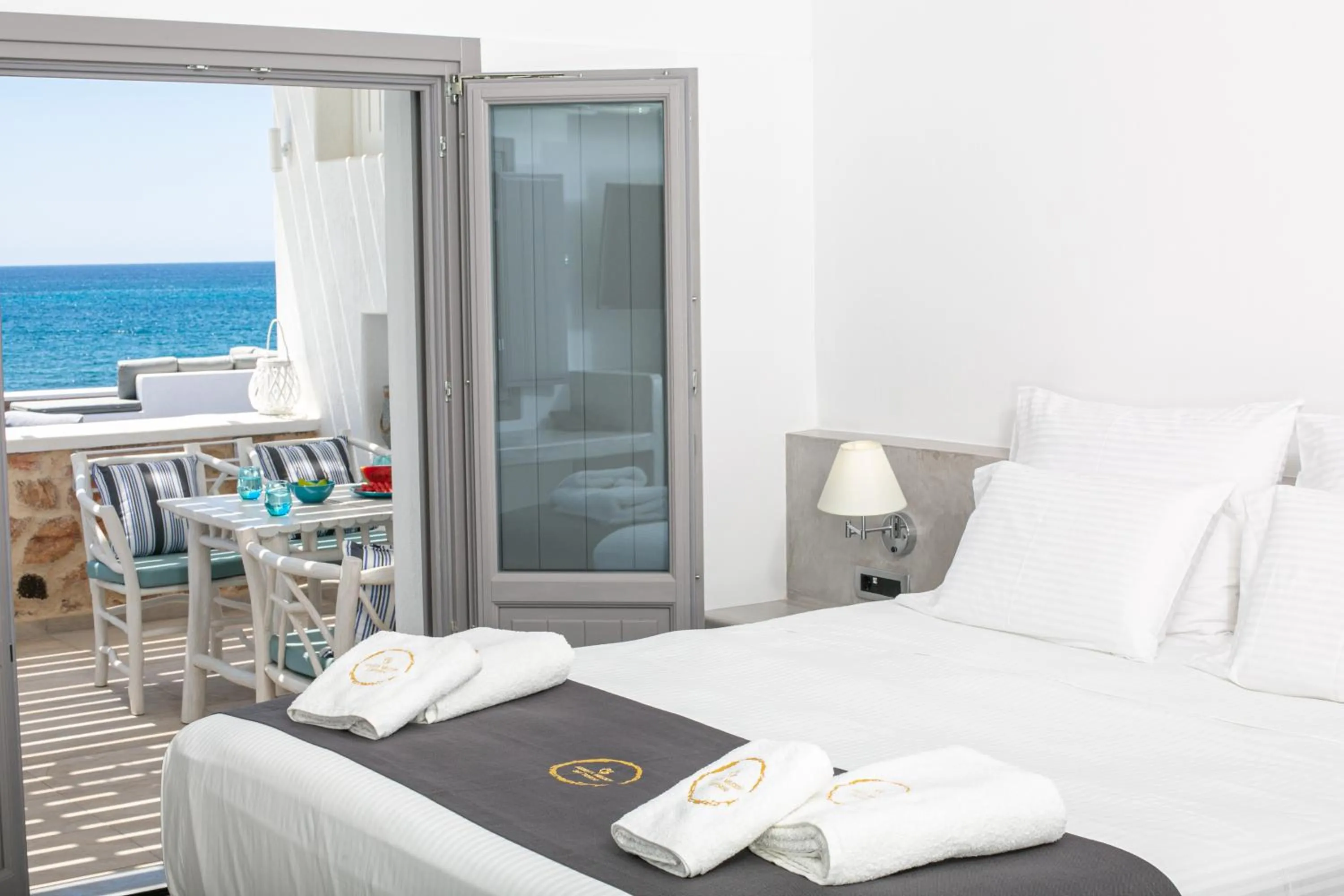 Bed in Aegean Melody Suites & Villas