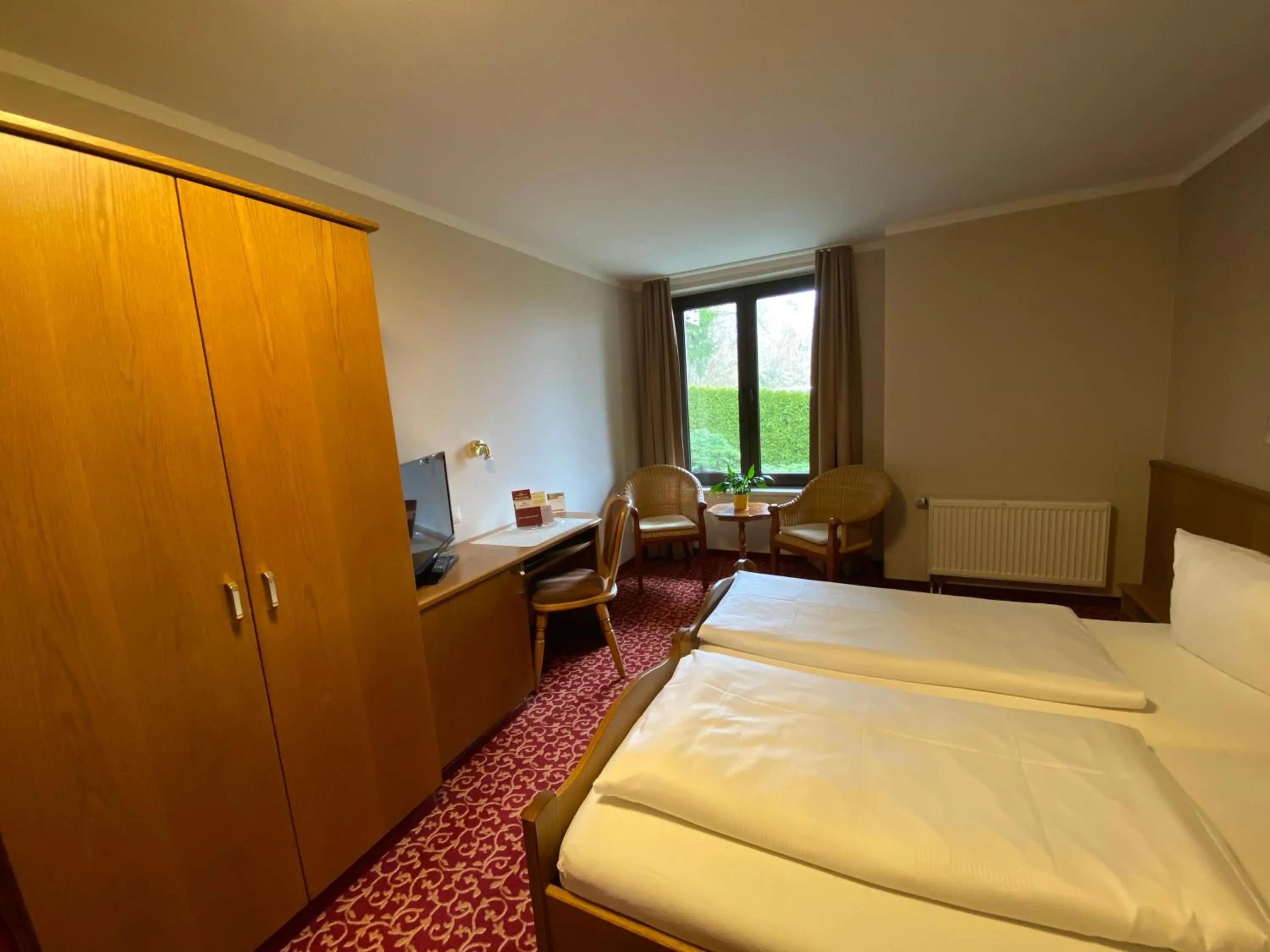 Photo of the whole room, Bed in Parkhotel Margaretenhof