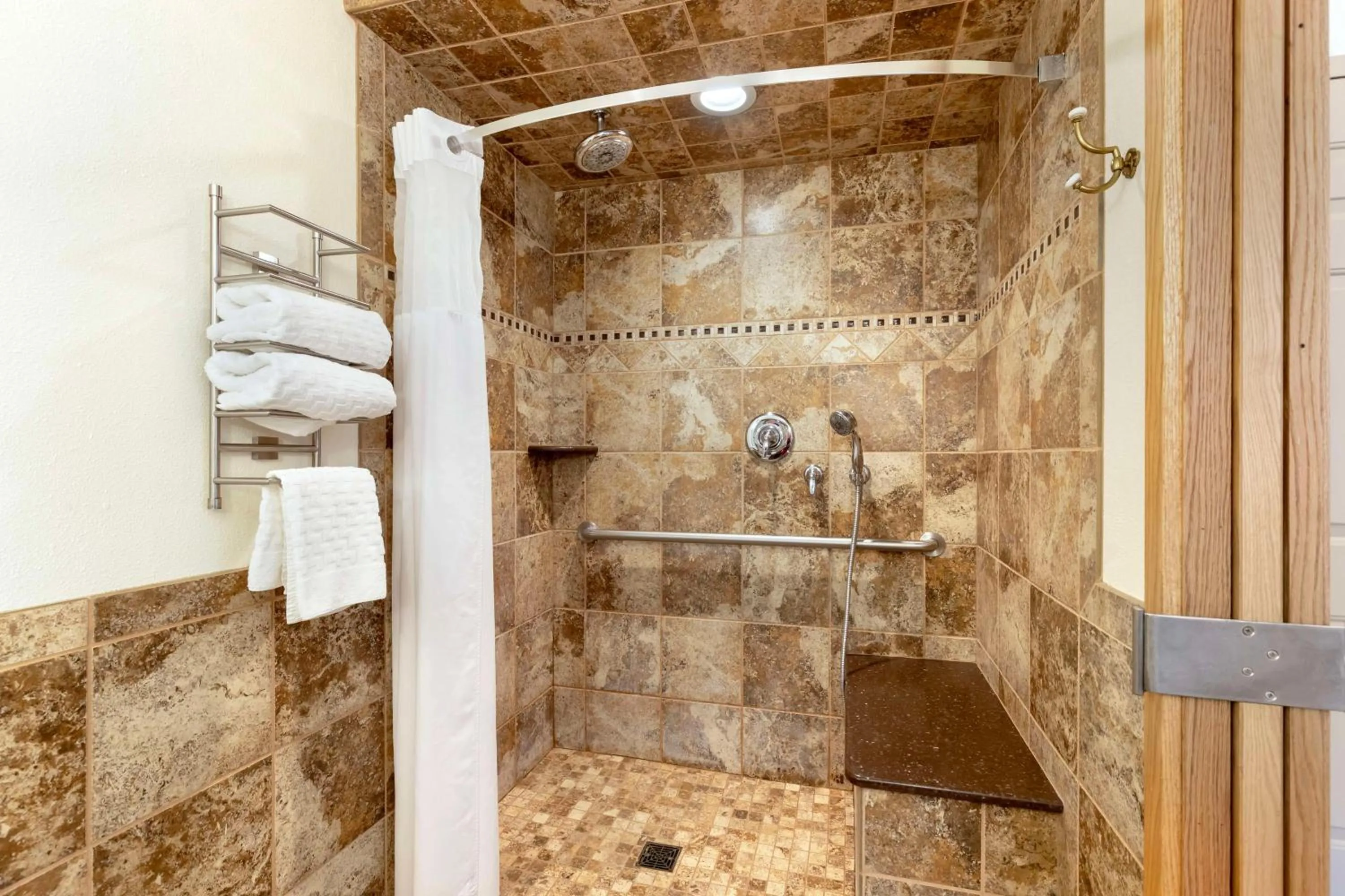 Bathroom in Best Western Plus Longbranch Hotel & Convention Center