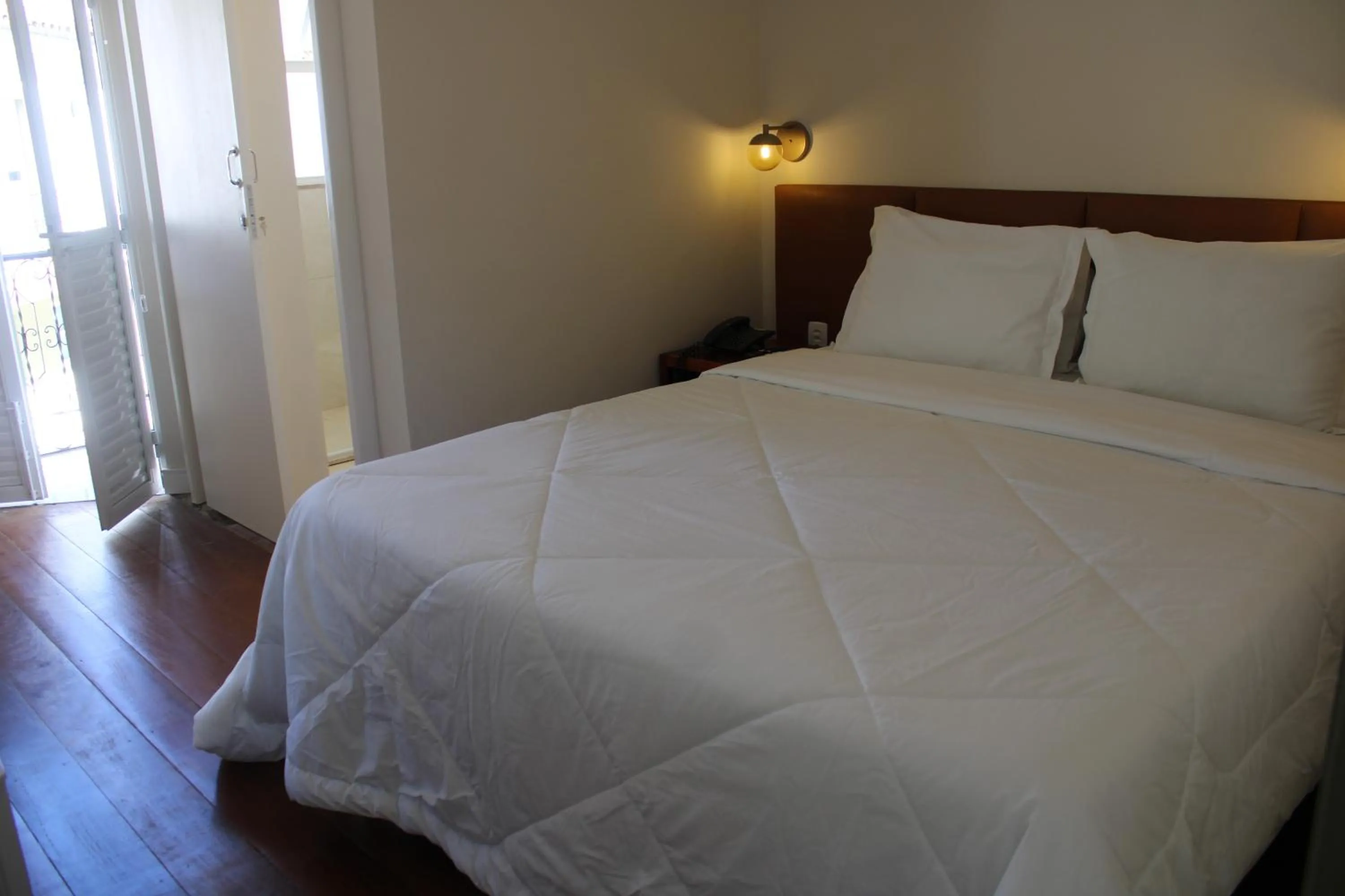 Bed in Pousada Mãe D'Água