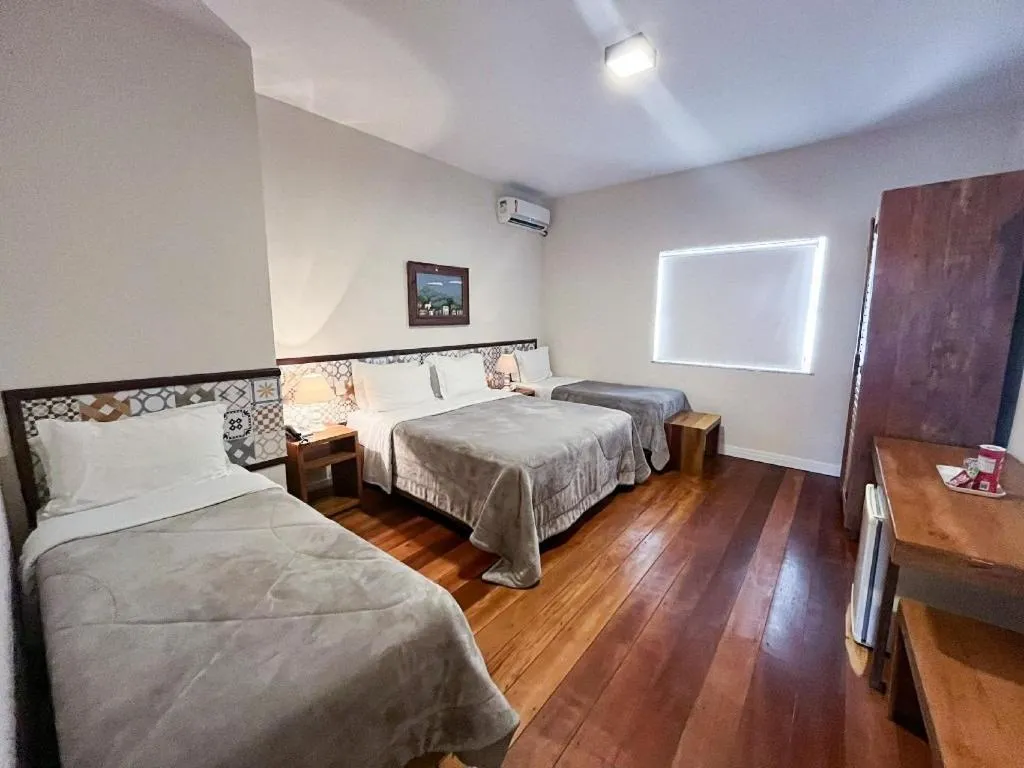 Bed in Pousada Mãe D'Água