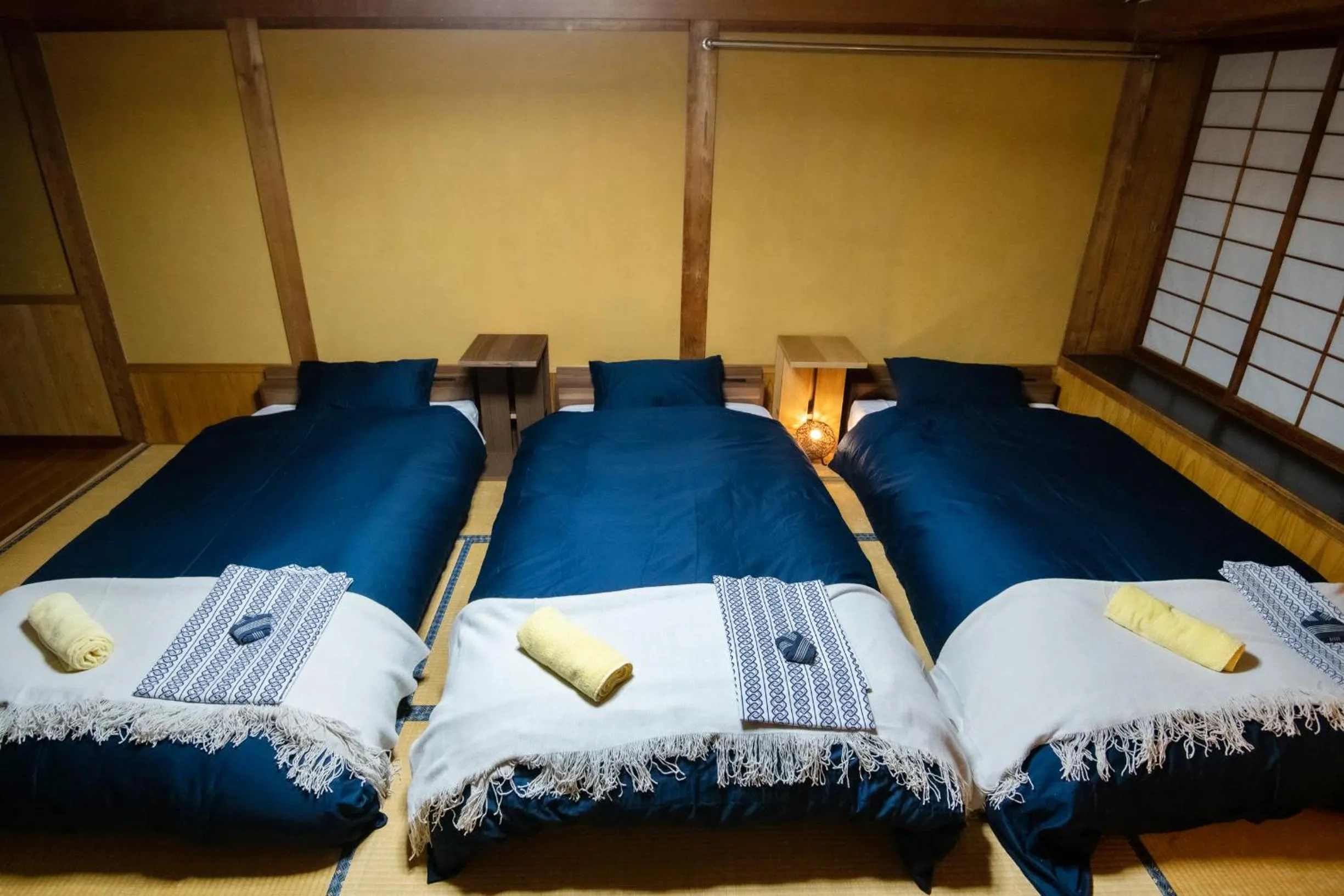 Bed in Toemu Nozawa Lodge