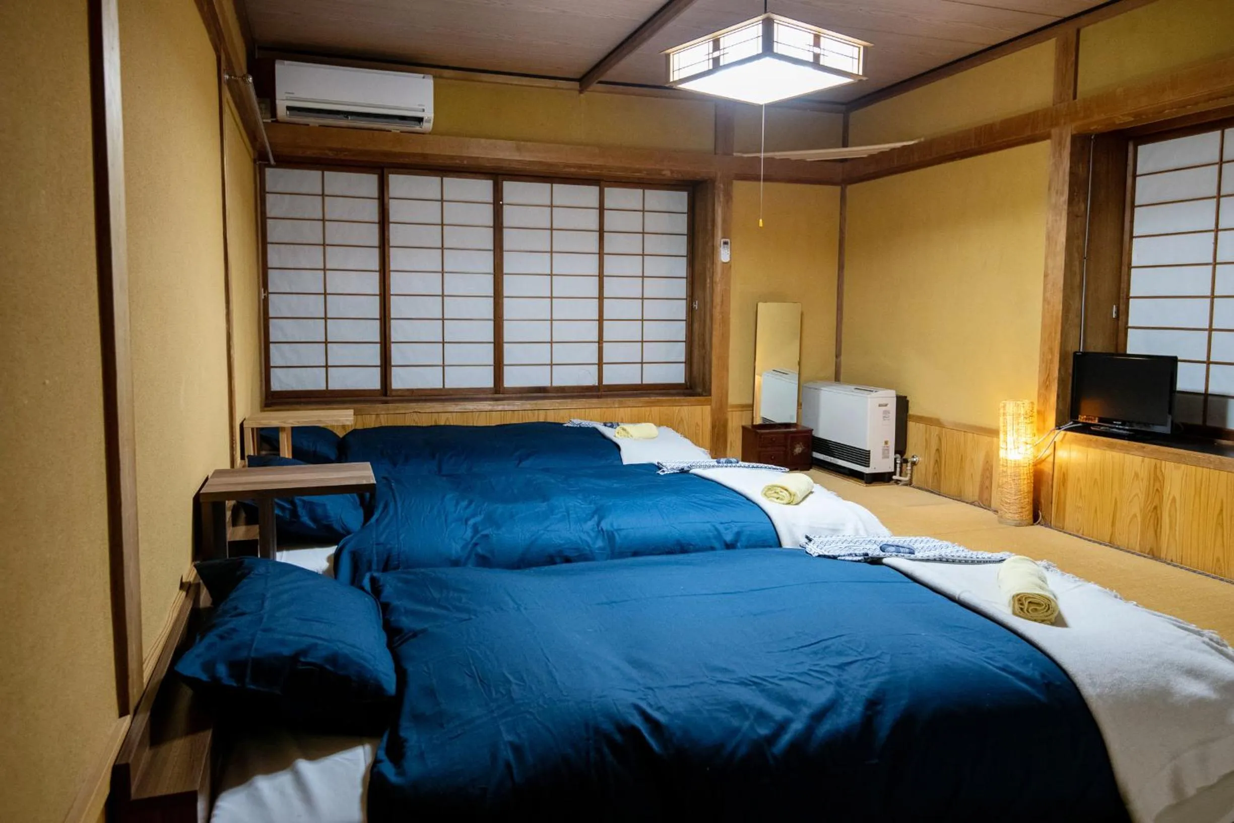 Bed in Toemu Nozawa Lodge