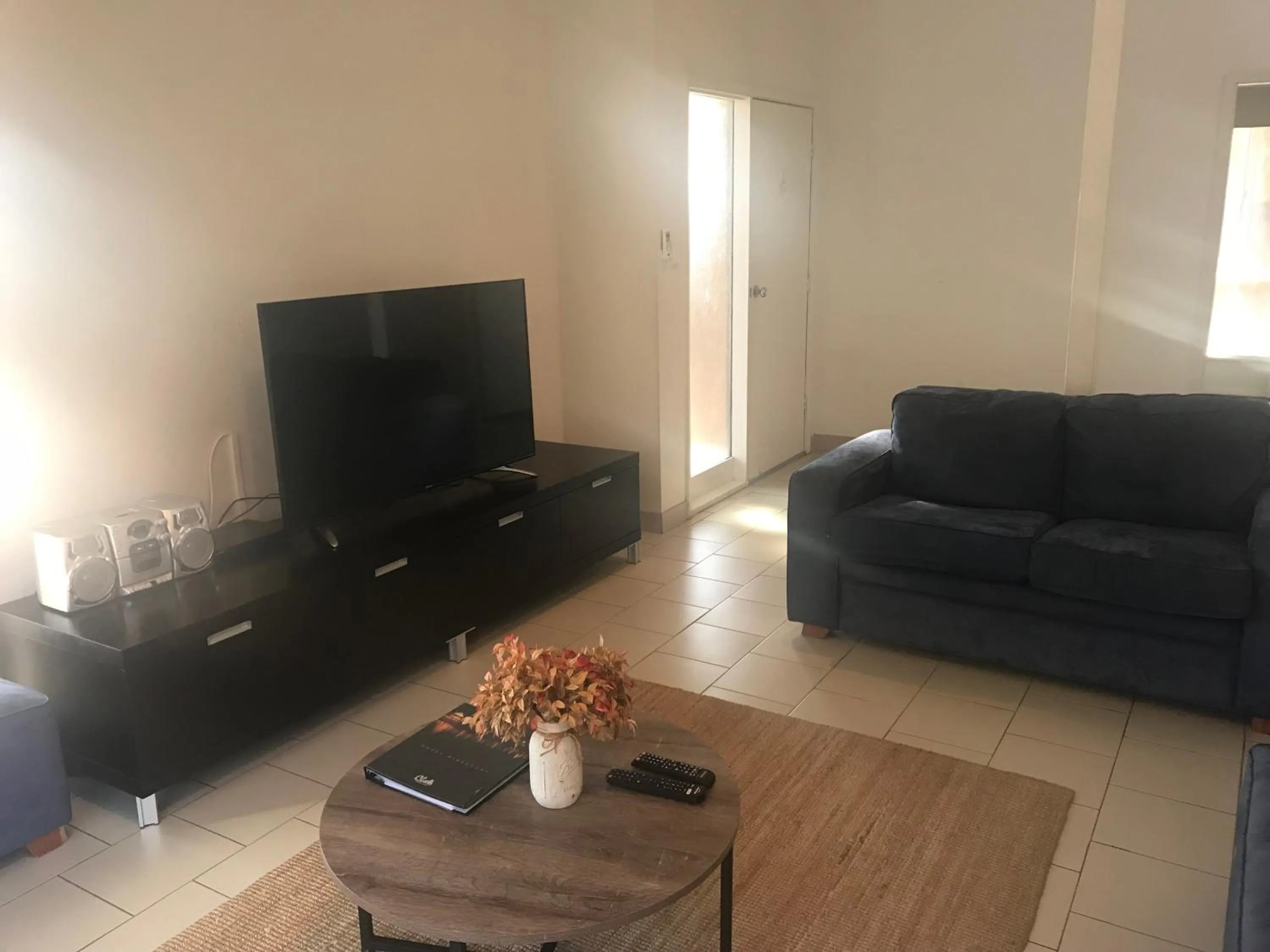 Living room in The Clan Terrigal