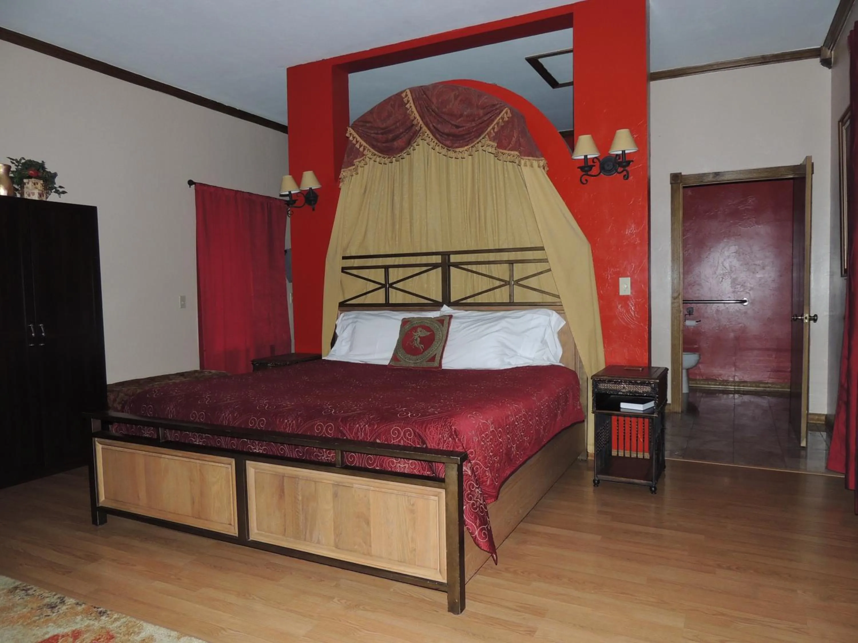 Bed in The Whispering Pines Inn
