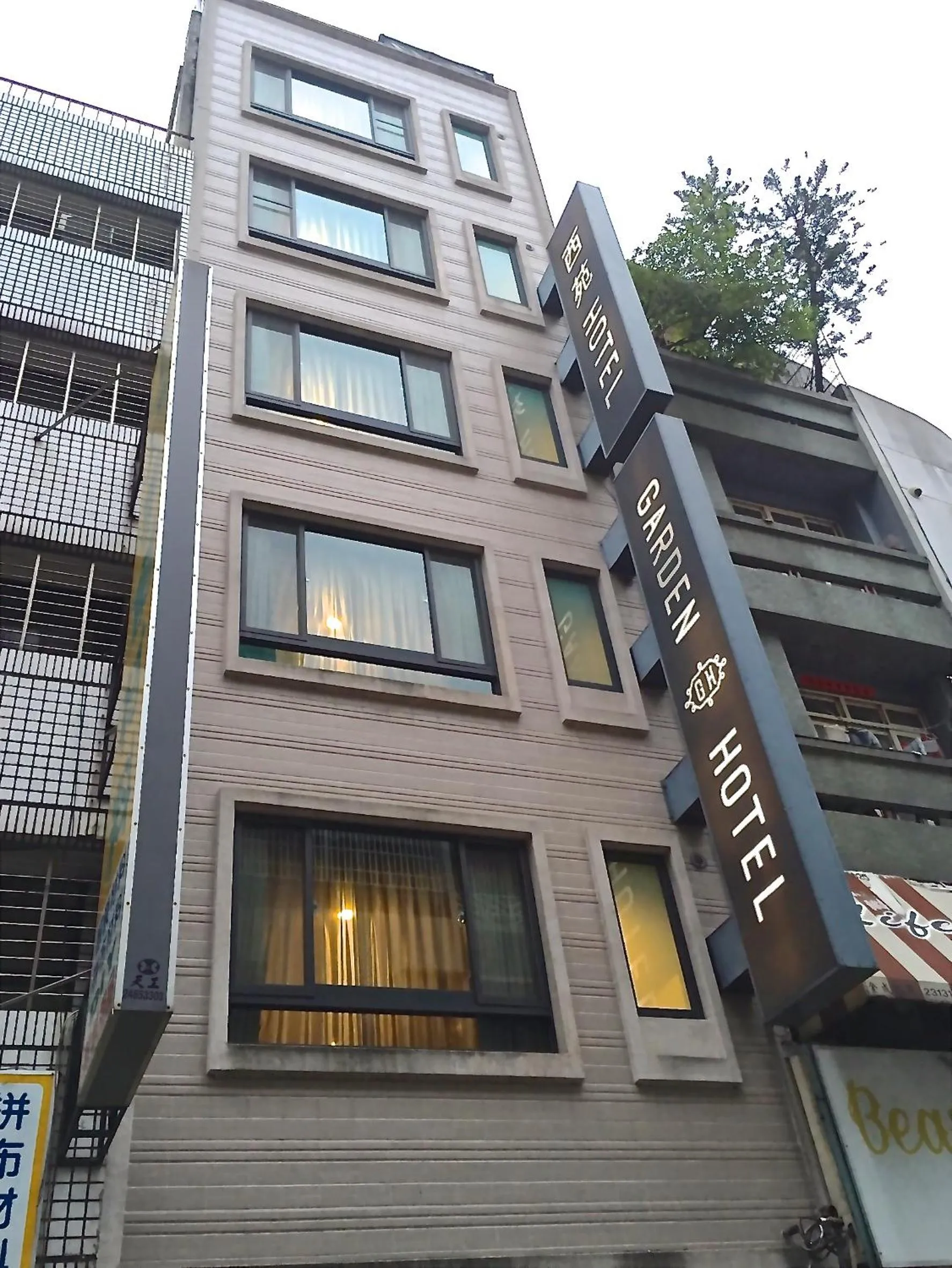 Property logo or sign in Garden Hotel